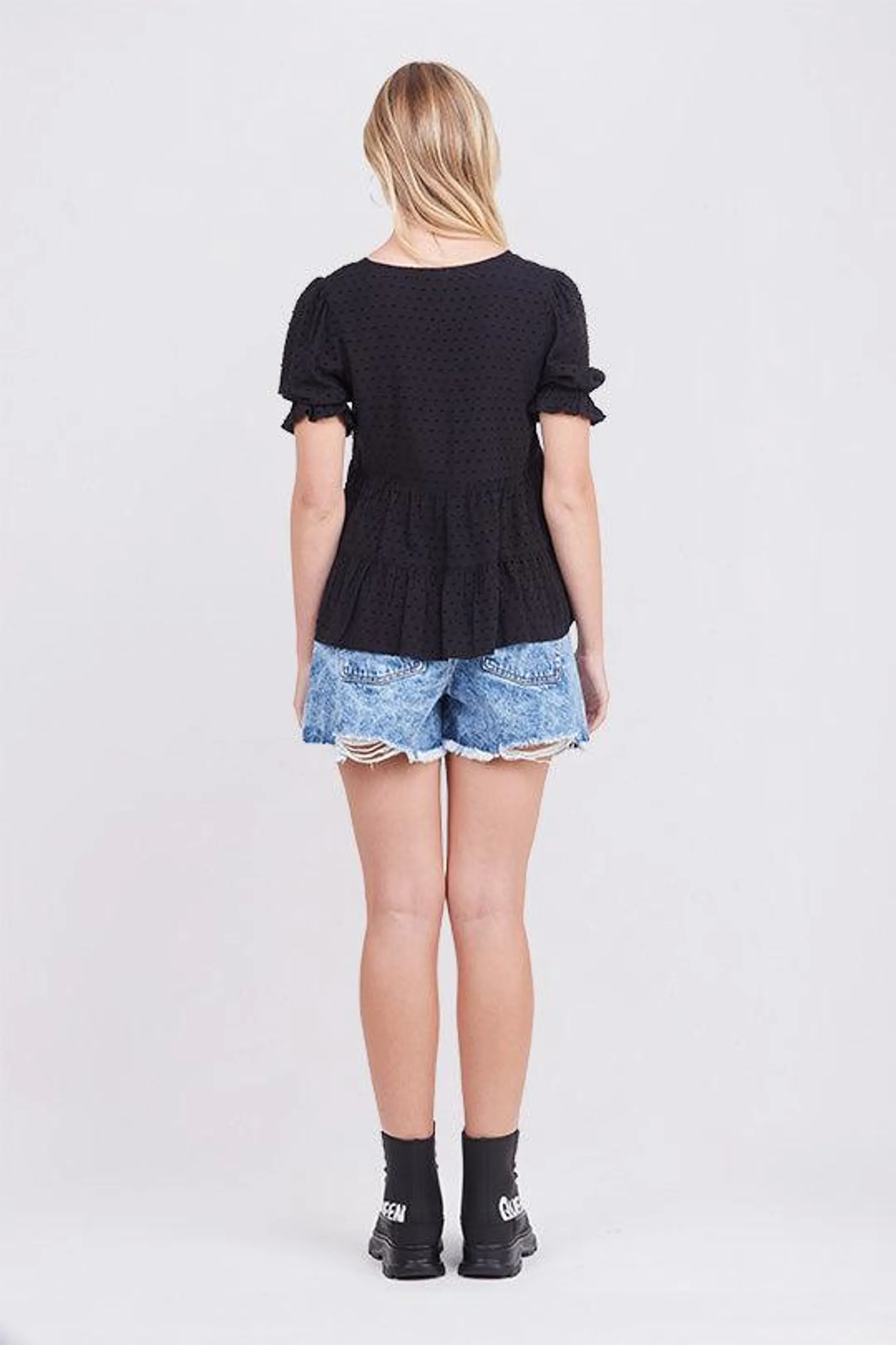 BLUSA NEGRO CON PEPLUM Y TELA CON TEXTURA