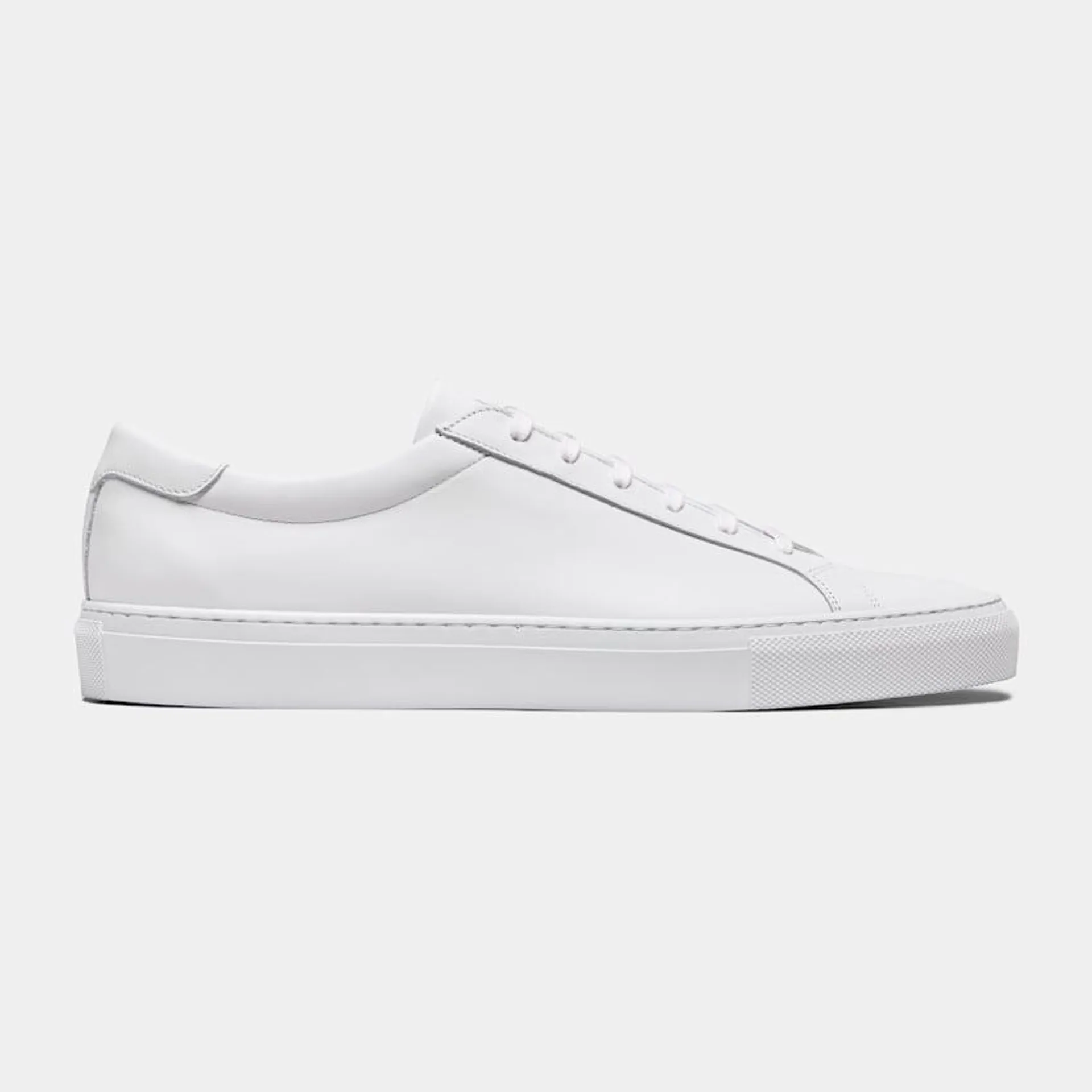 A versatile and classic white sneaker that brings casual appeal to any look, this calf leather pair features full light brown leather lining and a rubber sole.