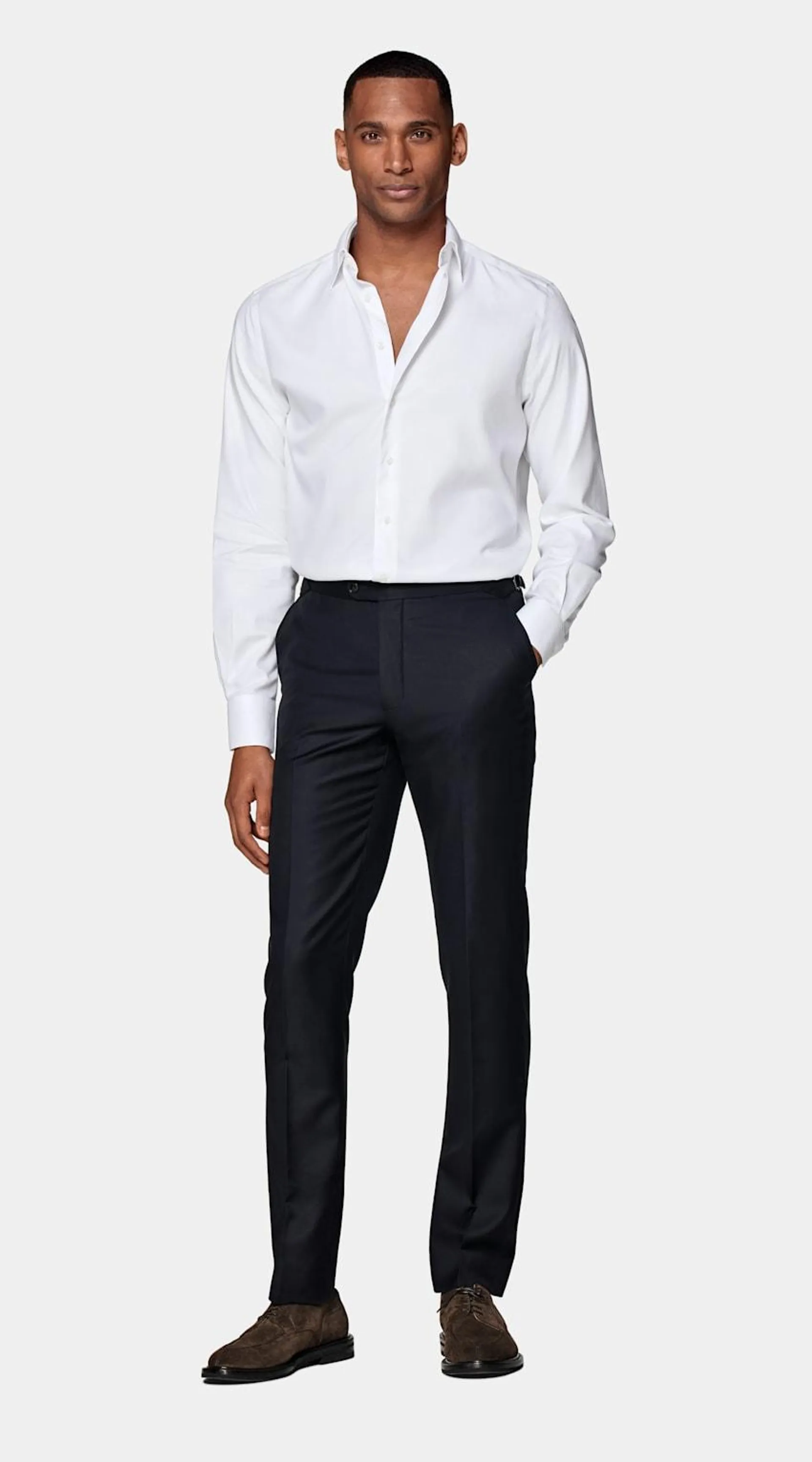 A classic all-occasion pick, this handsome white button-up is cut from crease-resistant Traveller two-ply cotton. Tailored to a slim fit, it features a classic collar and single cuff.