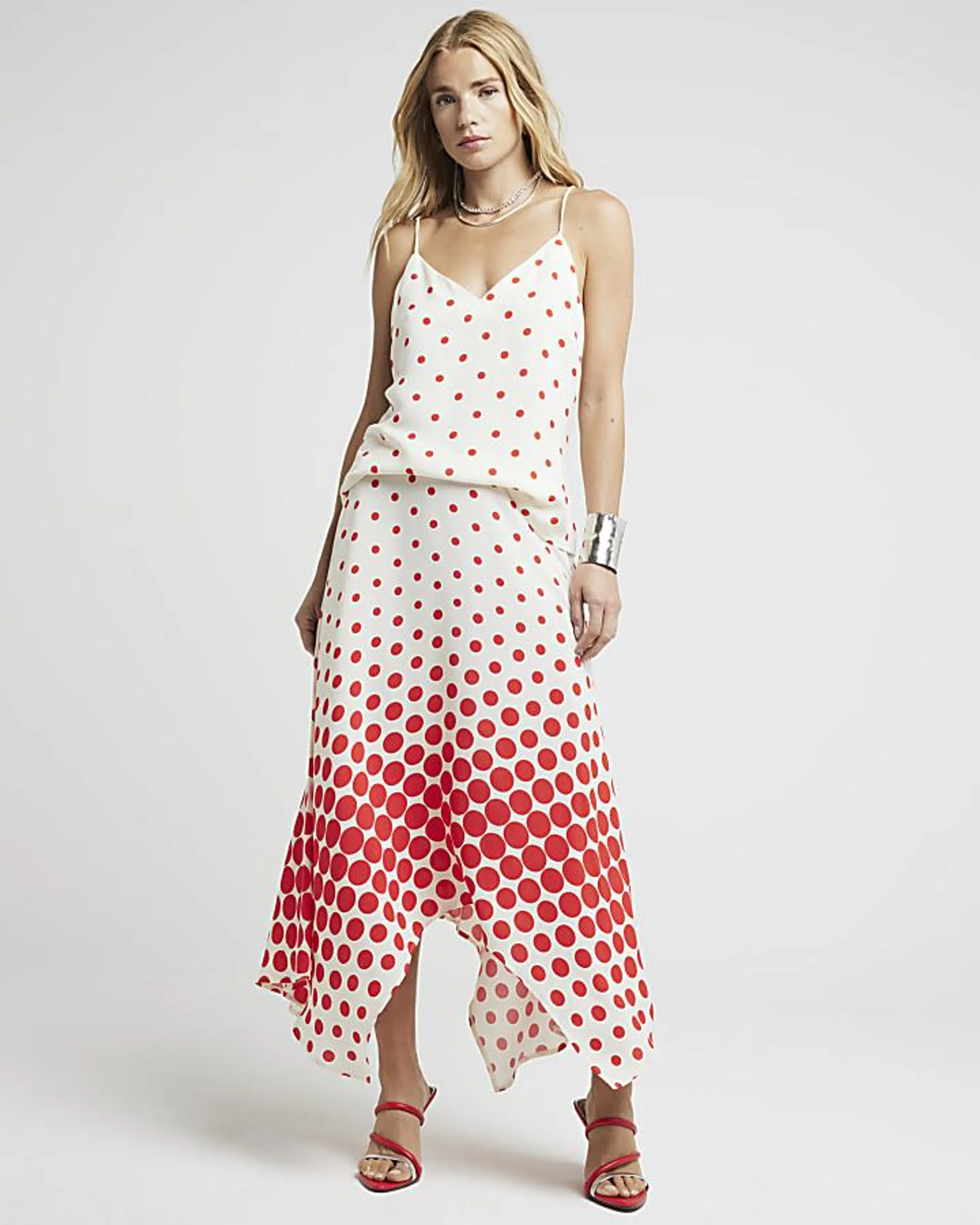 Red spot asymmetric midi skirt