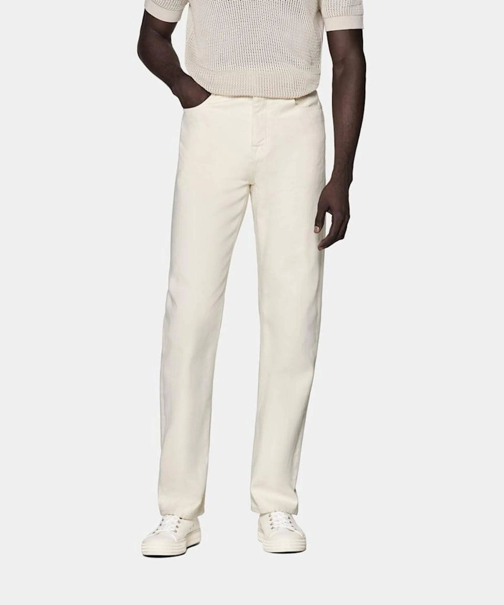 These off-white Charles fit jeans are tailored to a regular fit with a straight leg—loosening up the overall aesthetic for a more relaxed take on a classic pair.