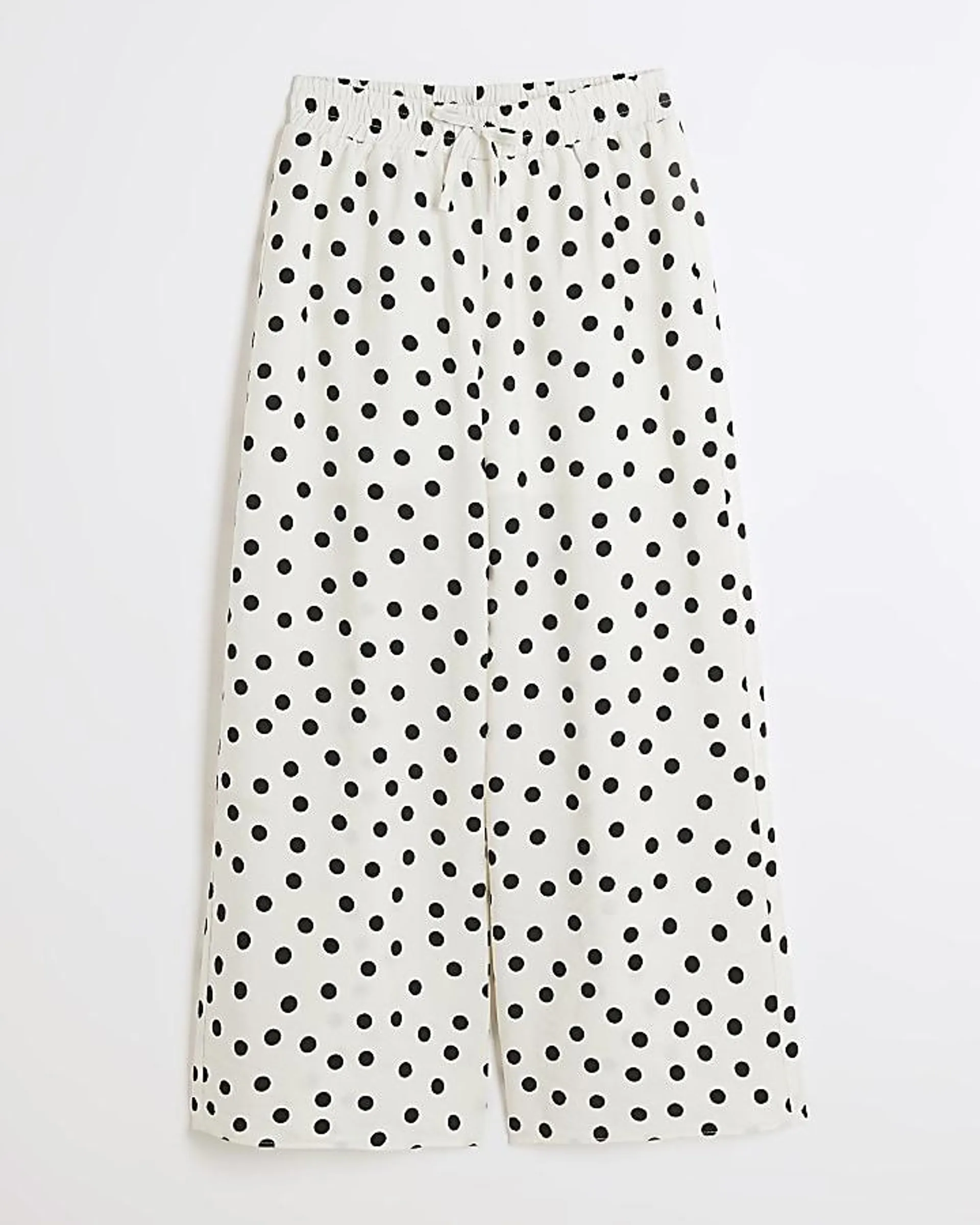 Girls white polka dot wide leg trousers