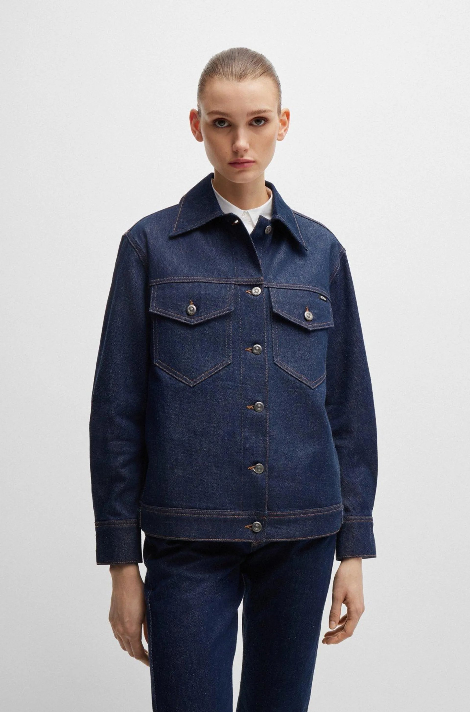 Blue trucker jacket in comfort-stretch denim