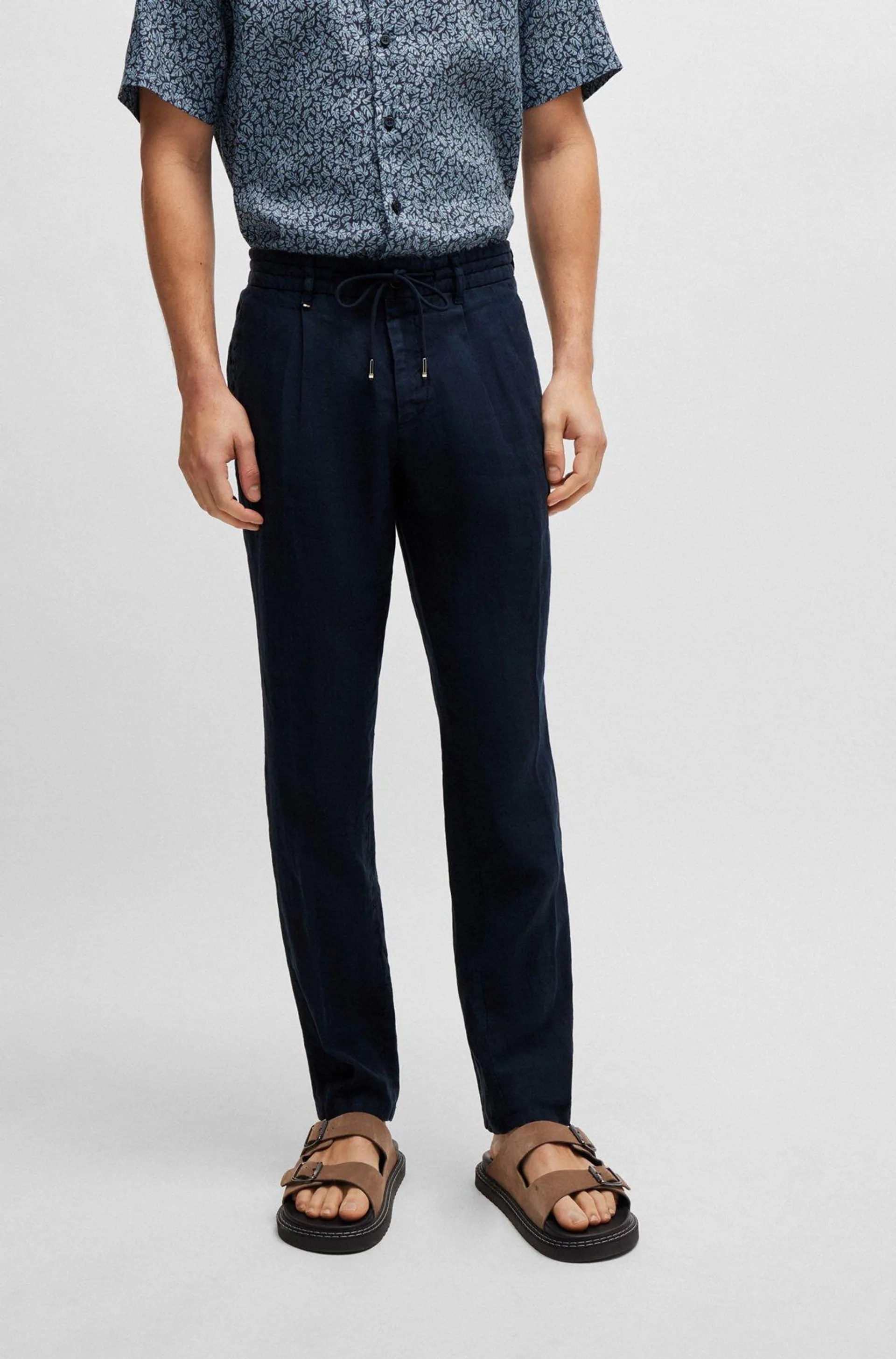 Slim-fit trousers in linen with tie waist