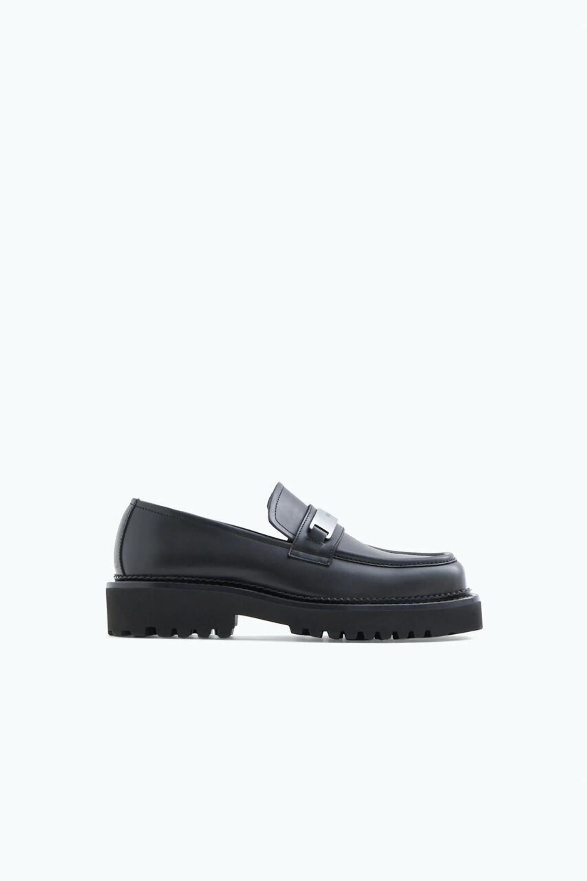 Square toe leather loafers with a lightweight tractor-style sole and branded metal buckle.