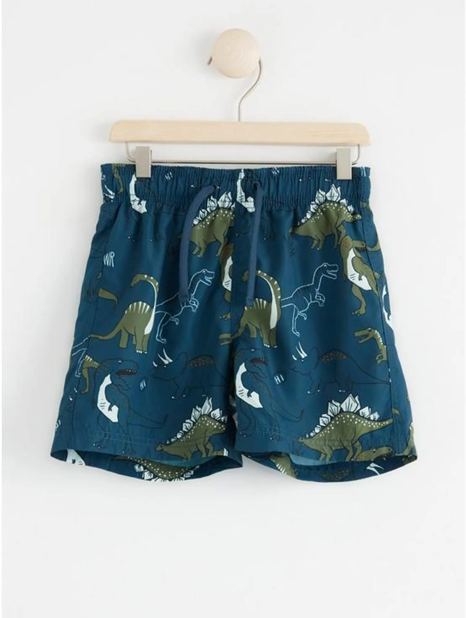 Badeshorts med dinosaurtrykk