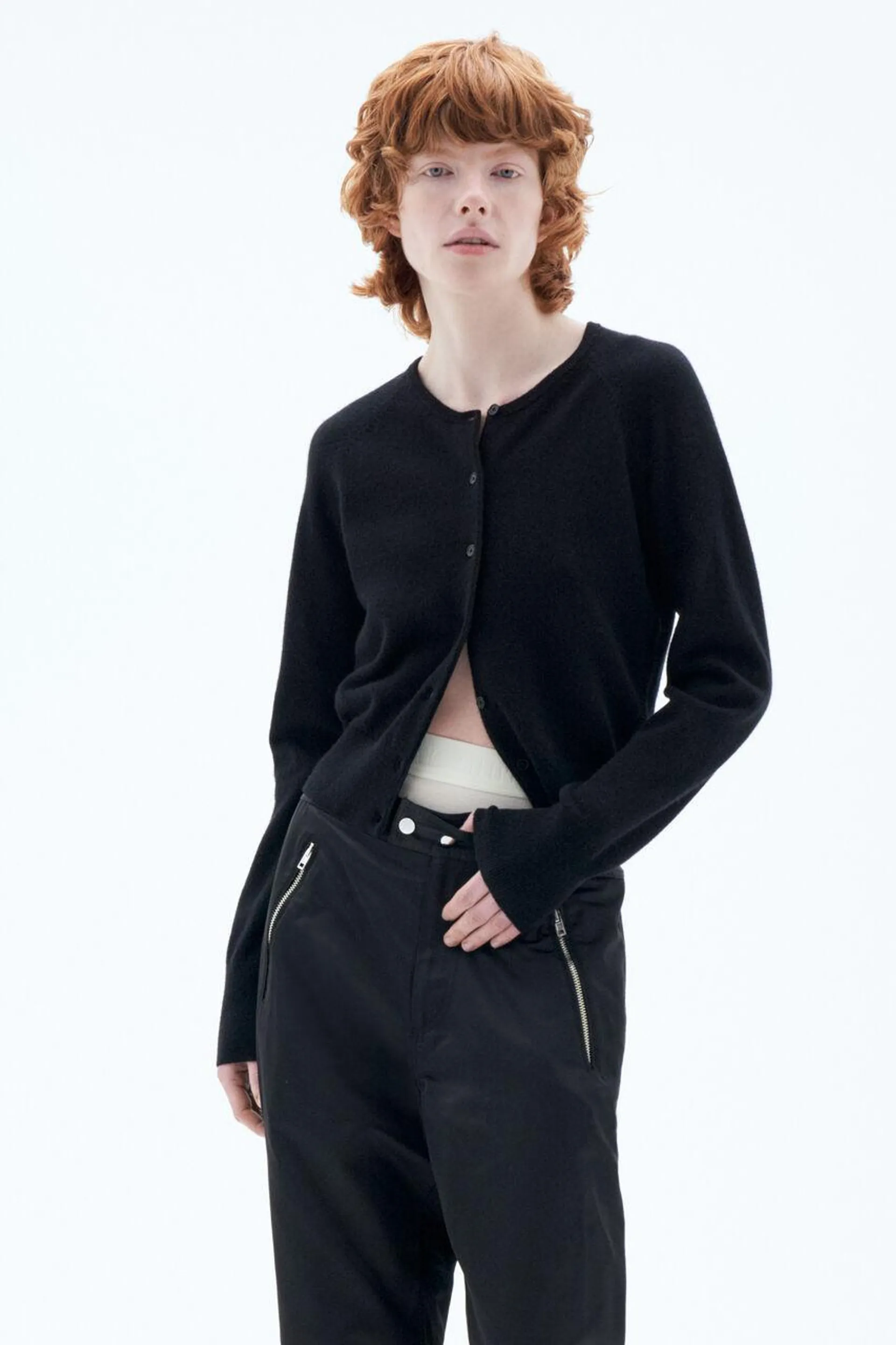 Slim lightweight cardigan in pure cashmere. Ideal for wearing as a layering piece through the seasons.