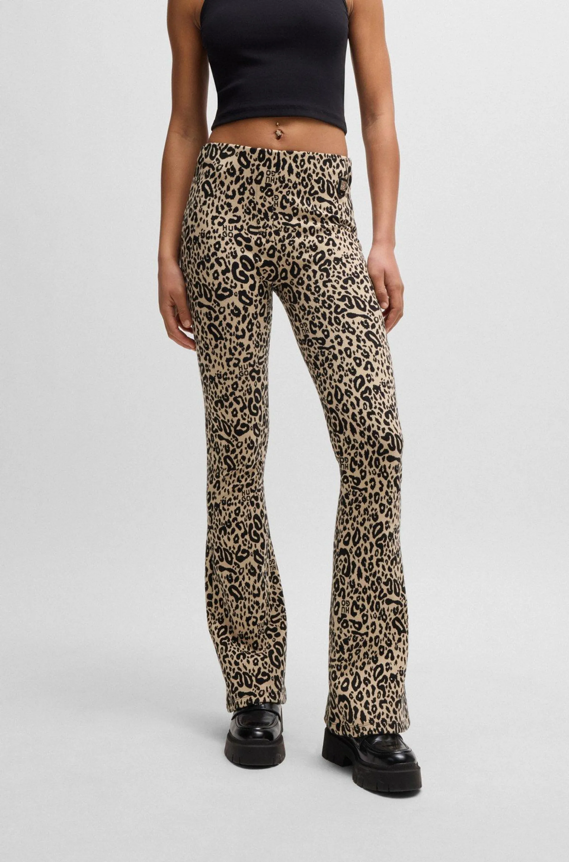 Slim-fit animal-print trousers with flared leg