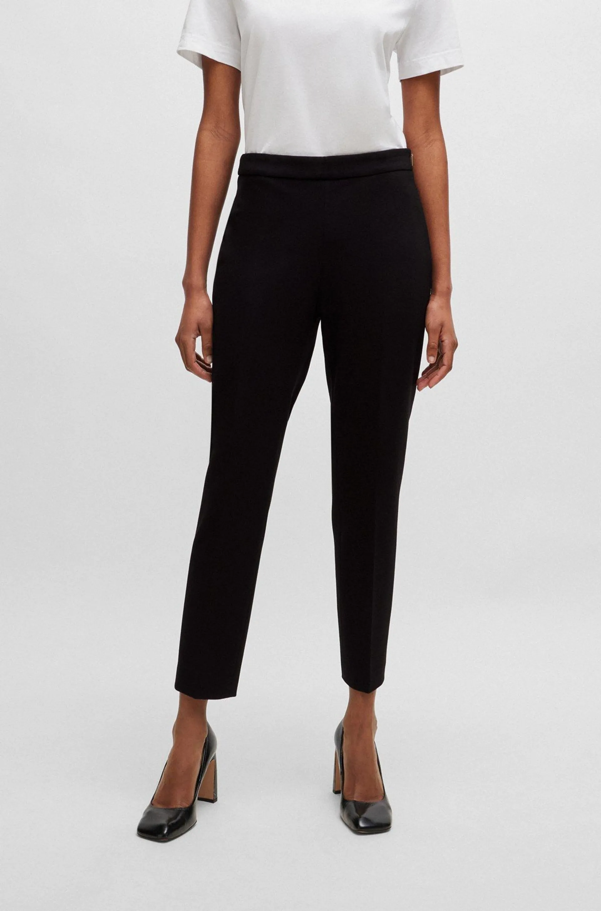 Regular-fit trousers in stretch fabric with tapered leg