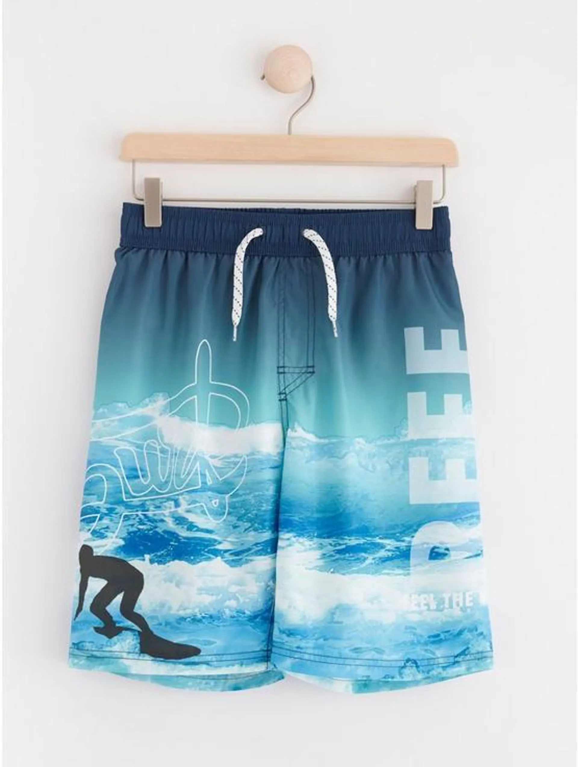 Badeshorts med surfemønster