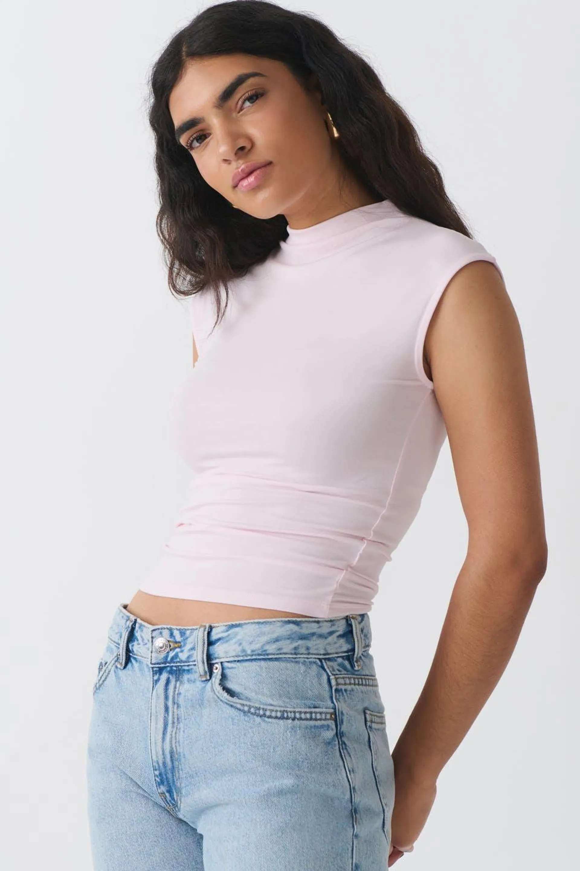 Soft touch funnel neck top