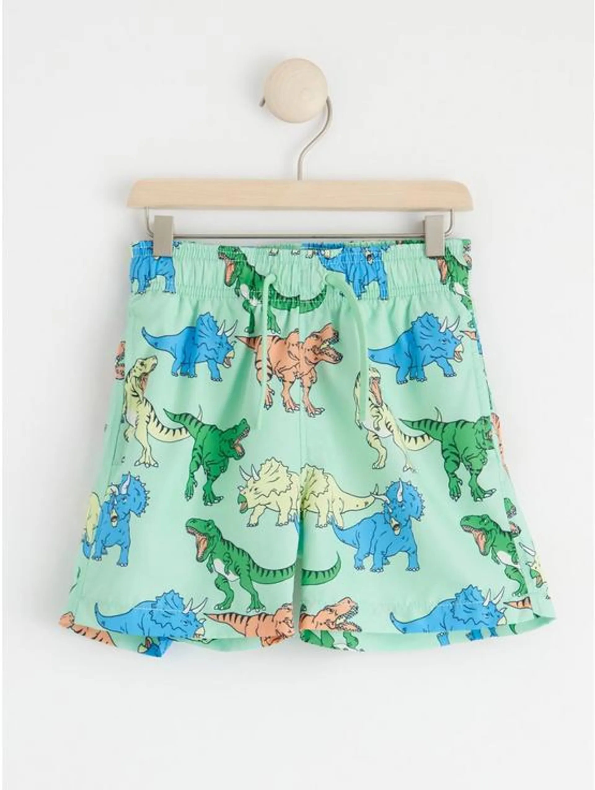 Badeshorts med dinosaurtrykk