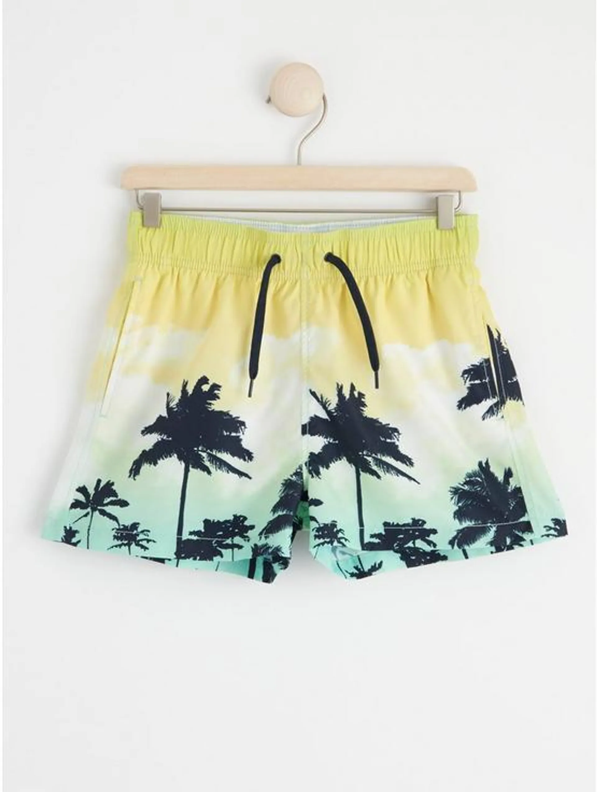 Badeshorts med palmer