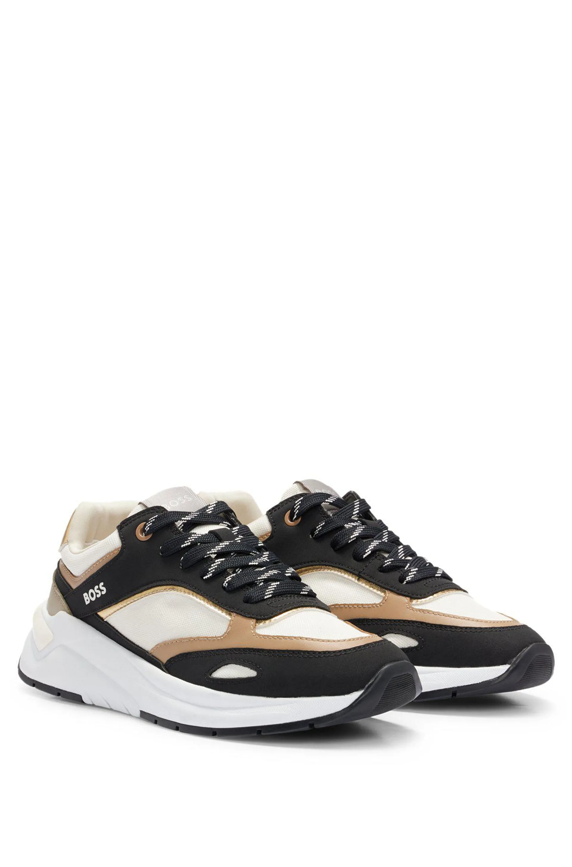 Mixed-material trainers with metallic details