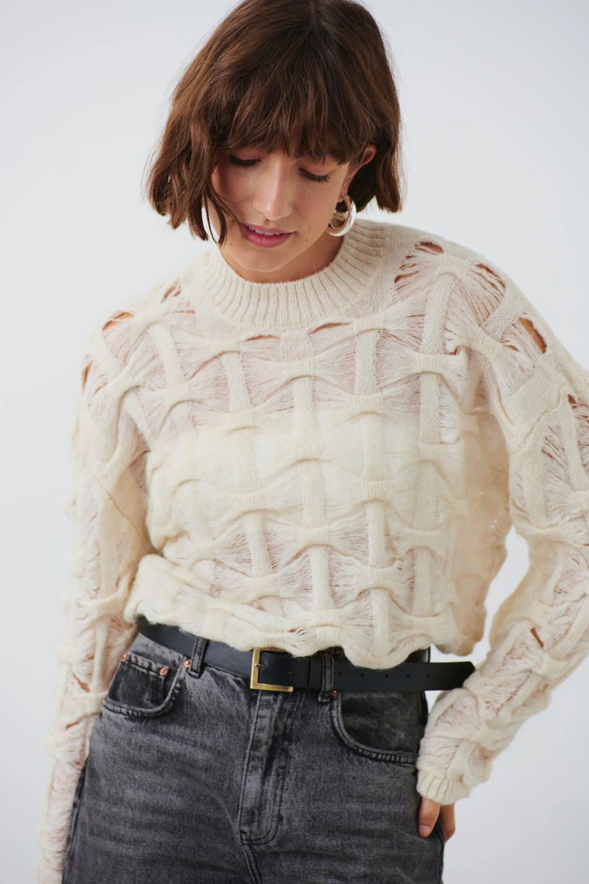Open work knitted sweater