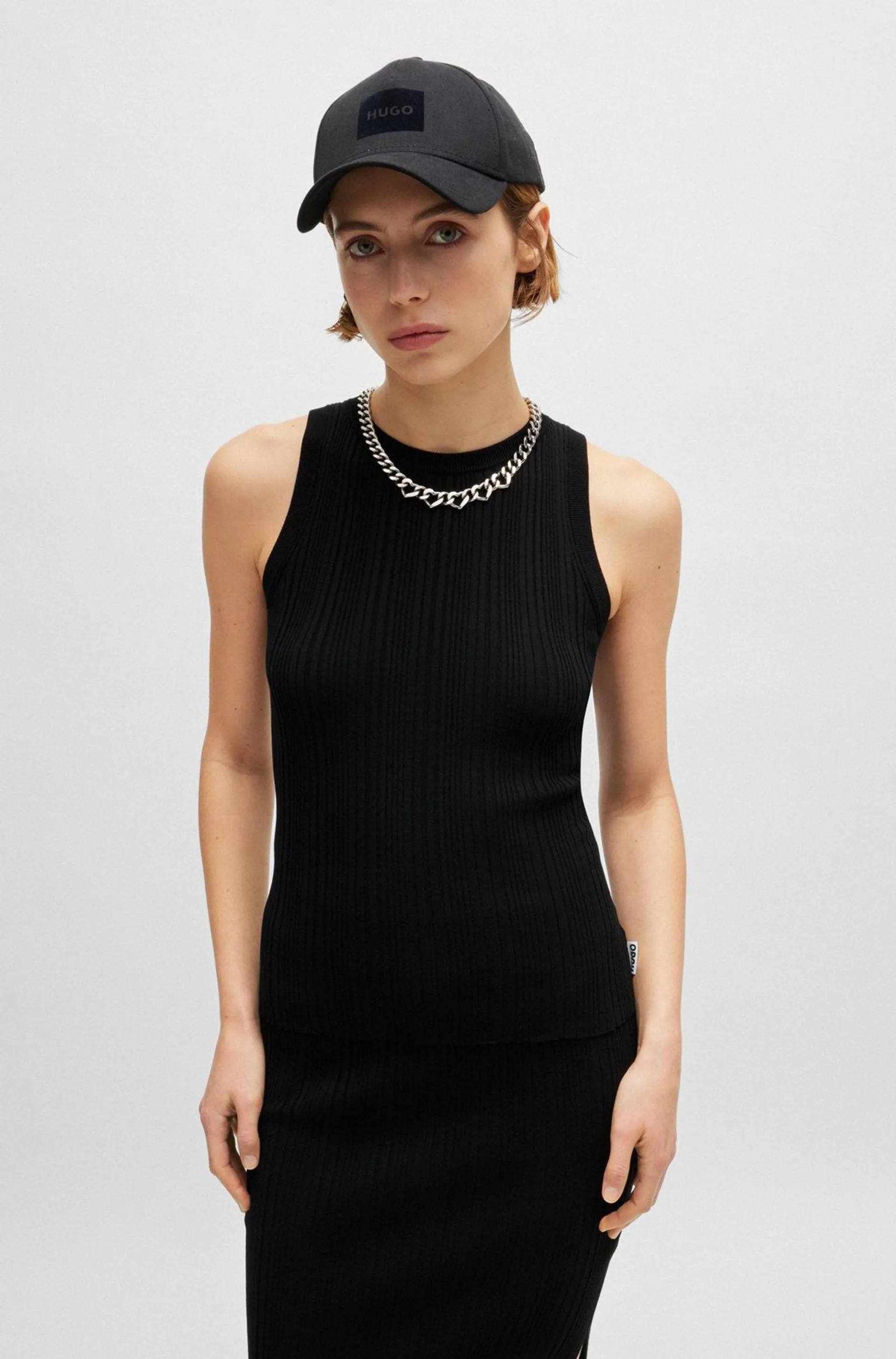 Slim-fit sleeveless top with irregular ribbed structure