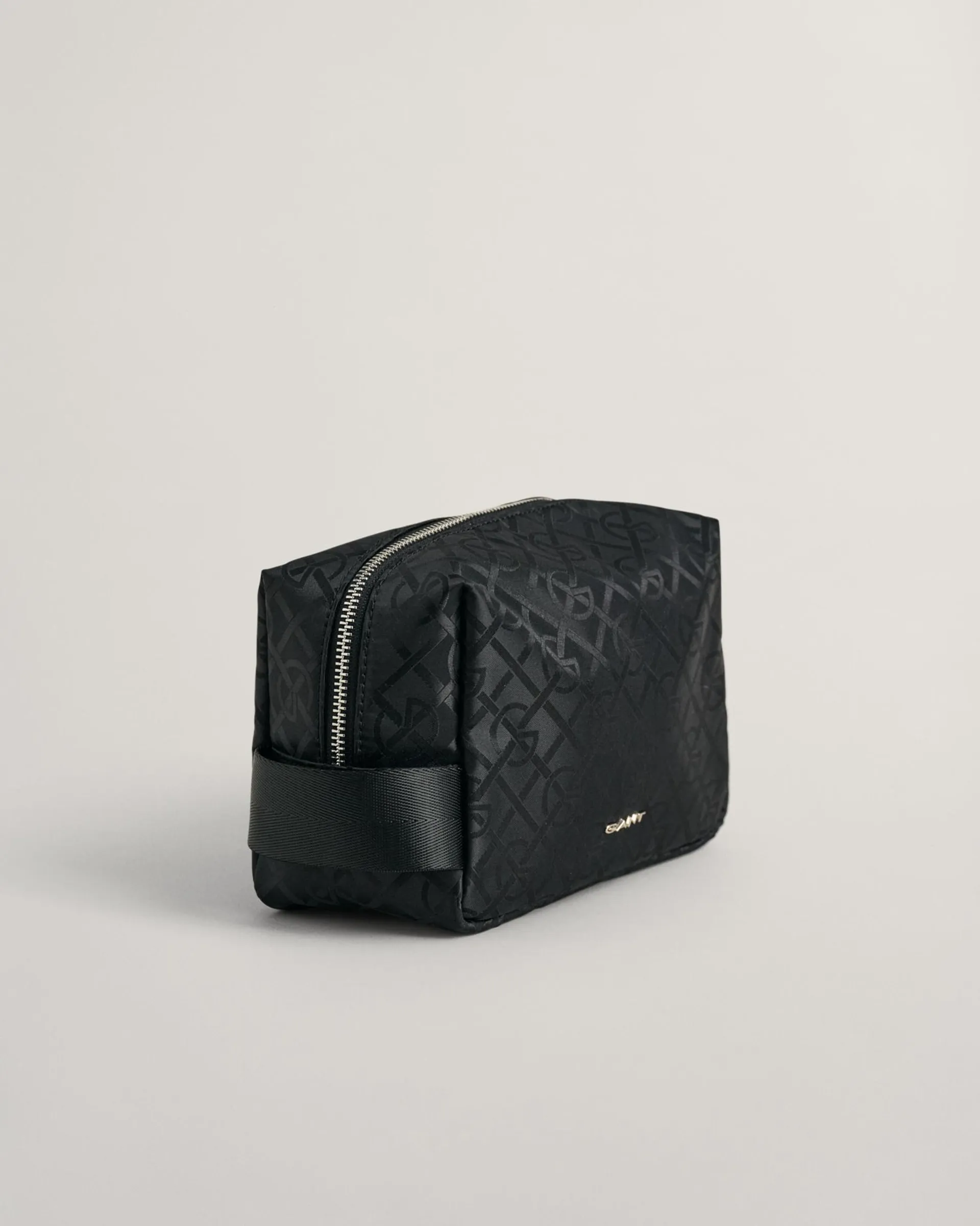 Toalettmappe med monogram-mønster