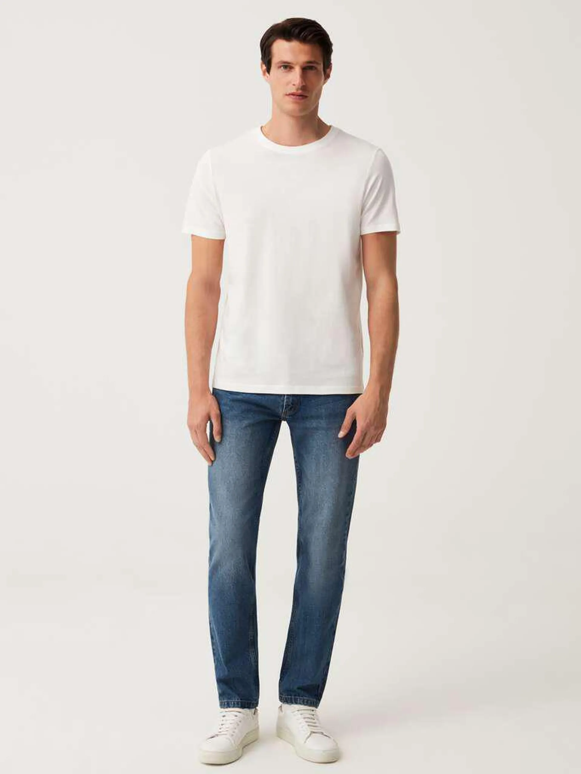 Slim-fit jeans with discolouring