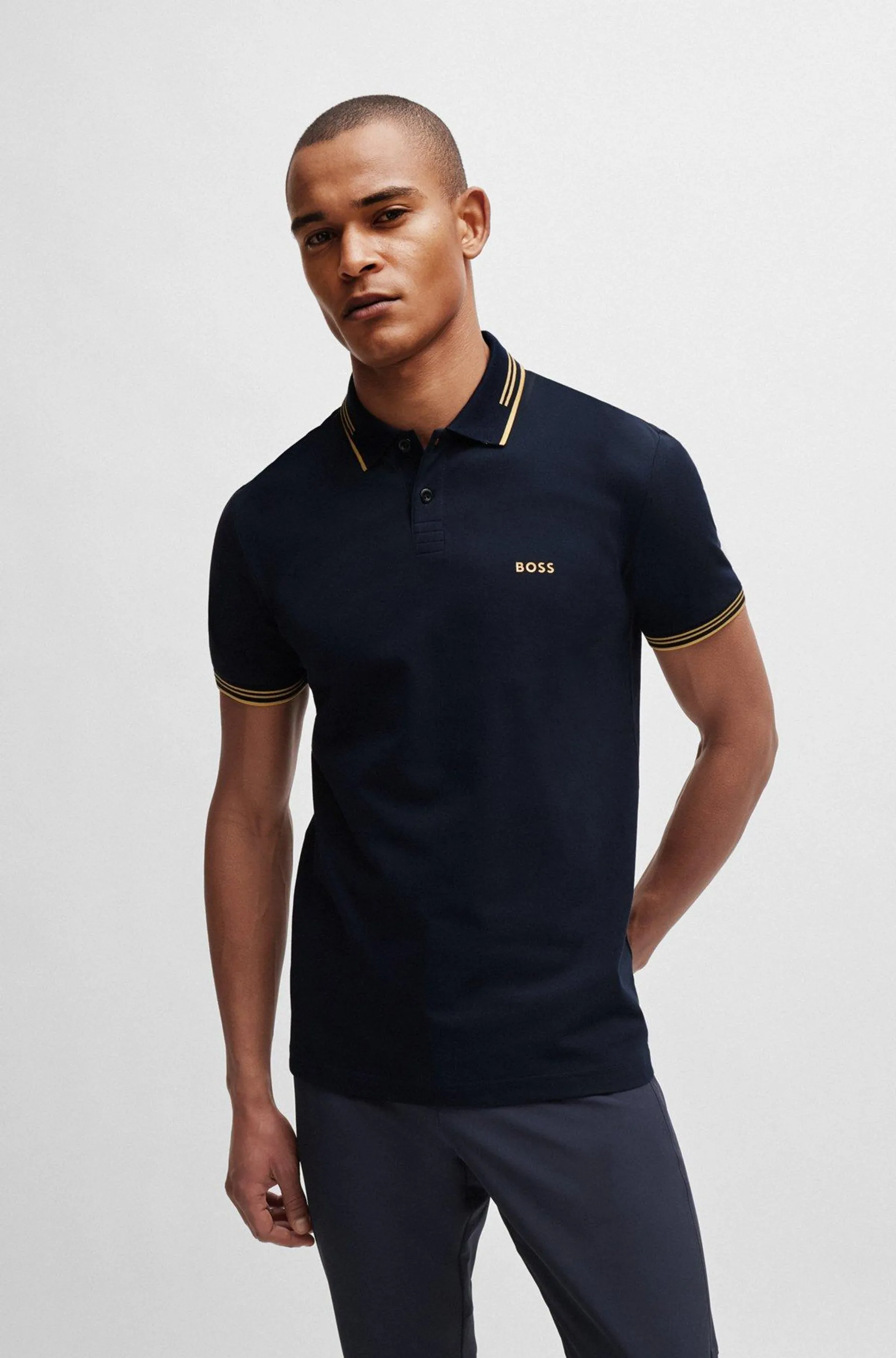 Polo slim fit de algodón elástico con detalles de la marca