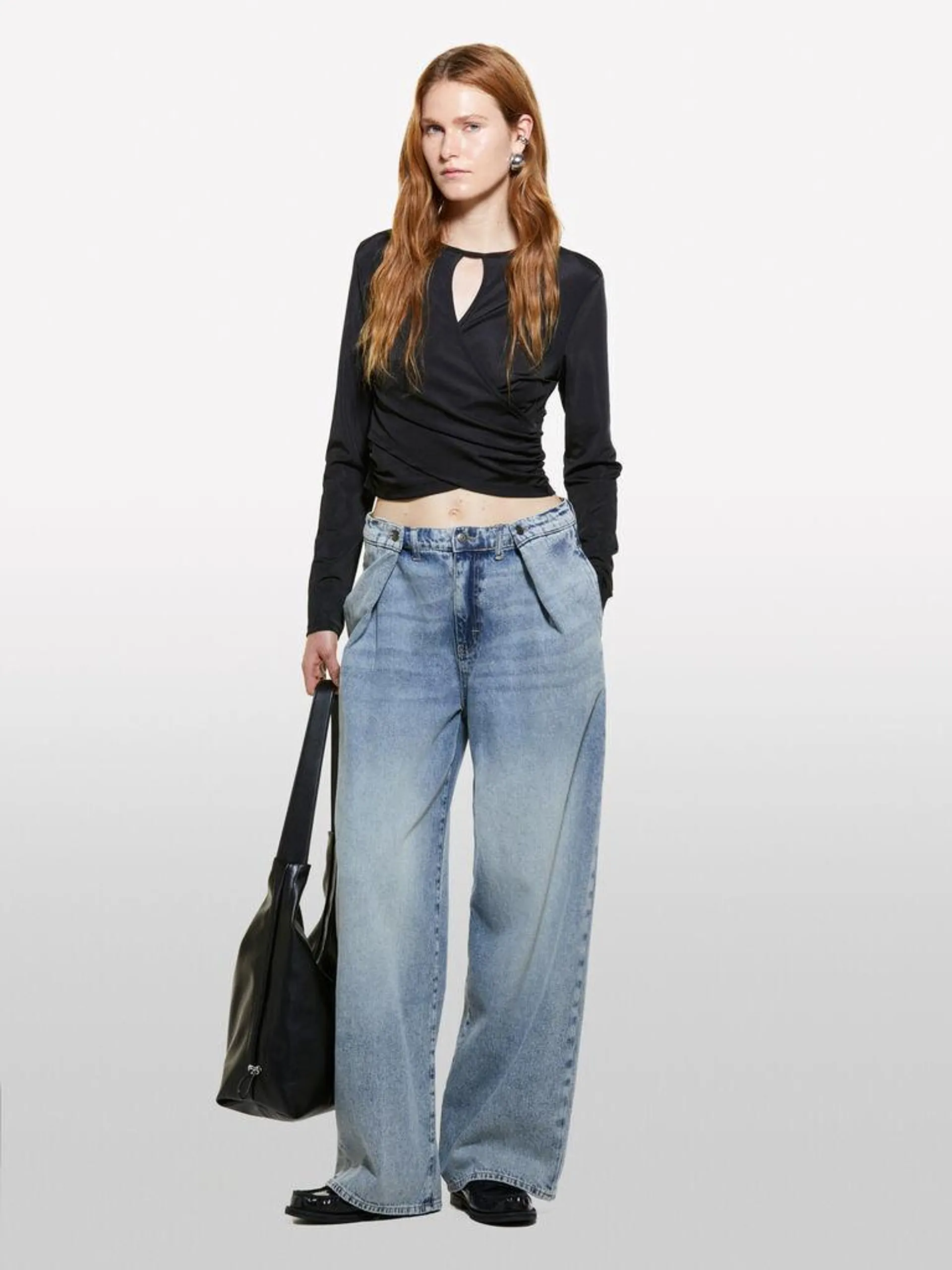 Jeans wide leg com pregas