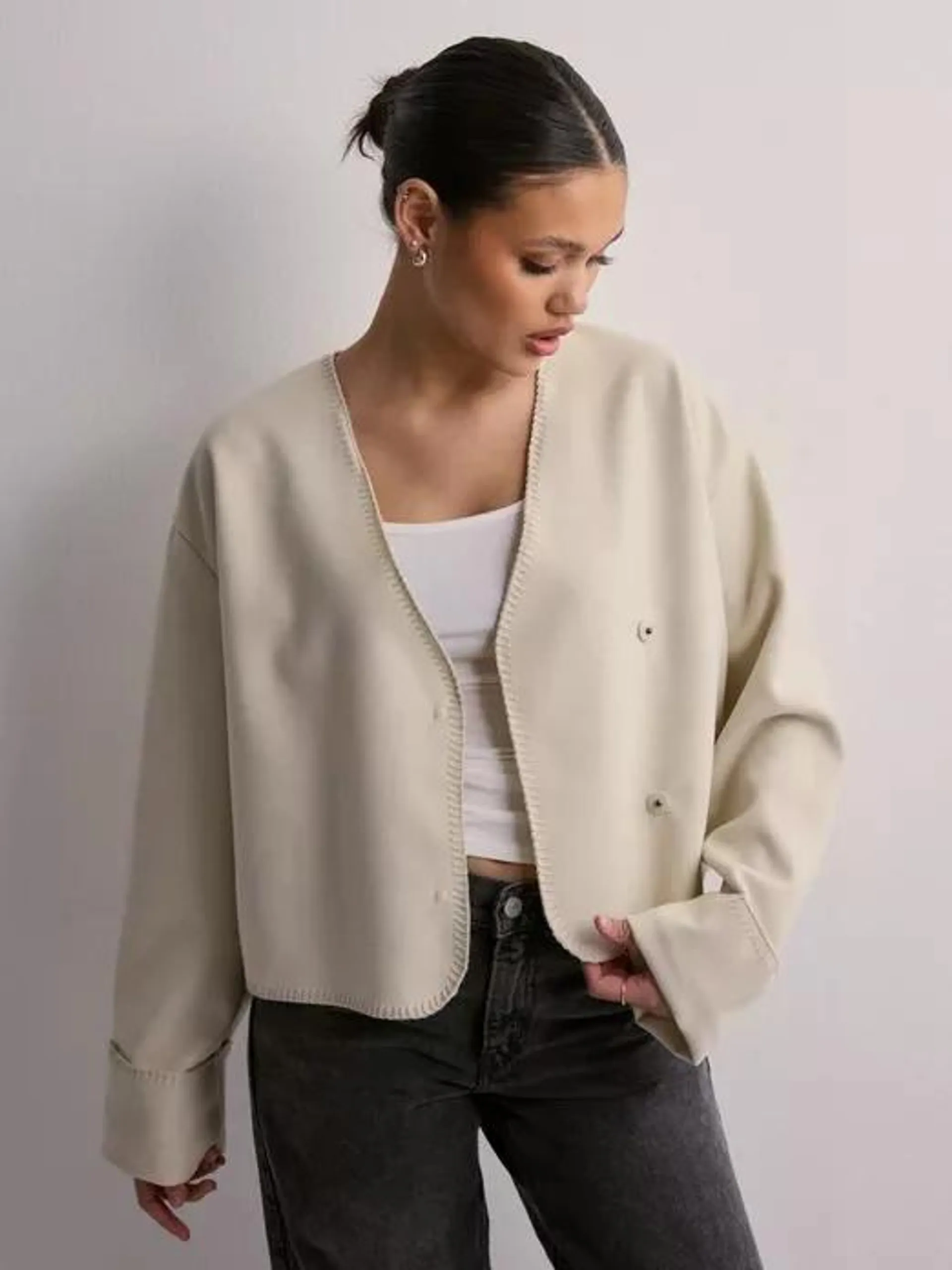 Blanket stitch jacket