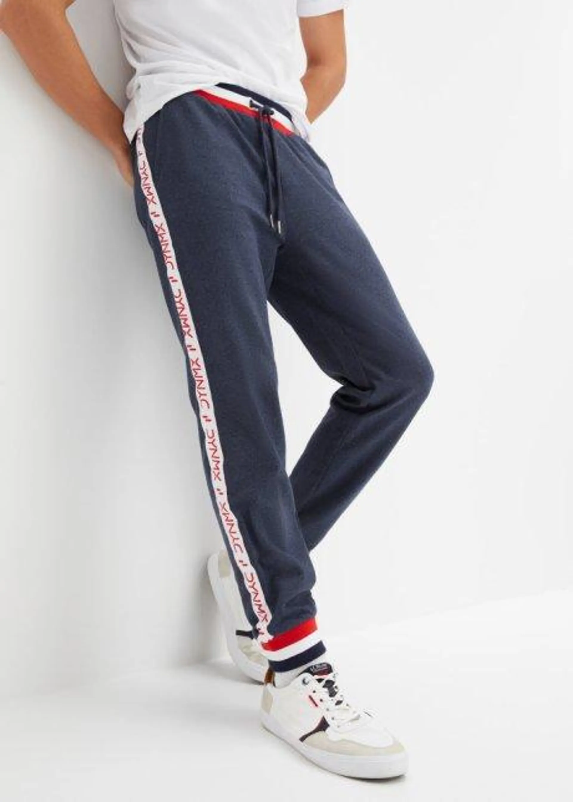 Pantaloni da jogging con cinta a costine e stampa statement