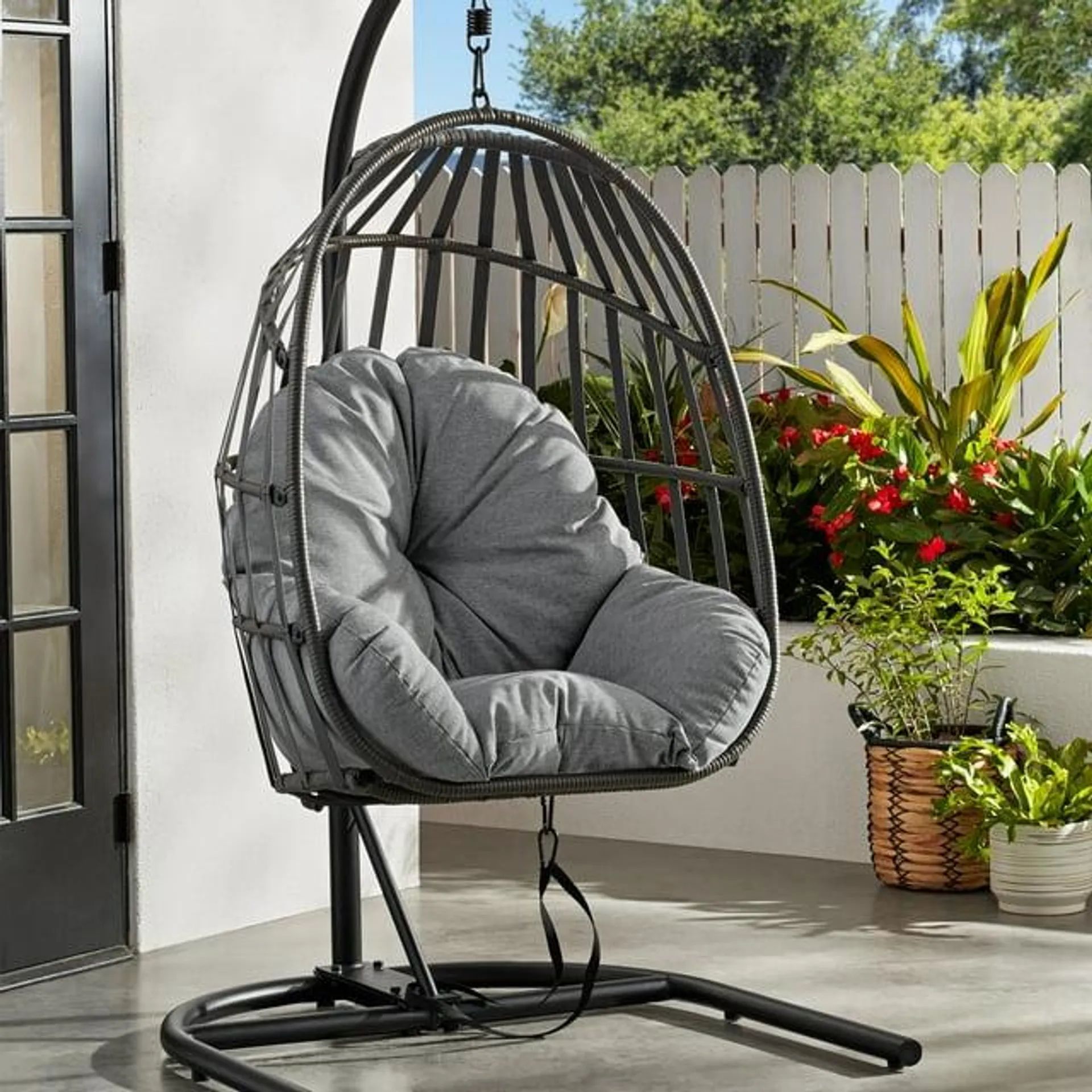 Mainstays Wicker Outdoor Patio Hanging Egg Chair with Gray Olefin Cushion and Black Metal Stand, 250 lbs Maximum Weight