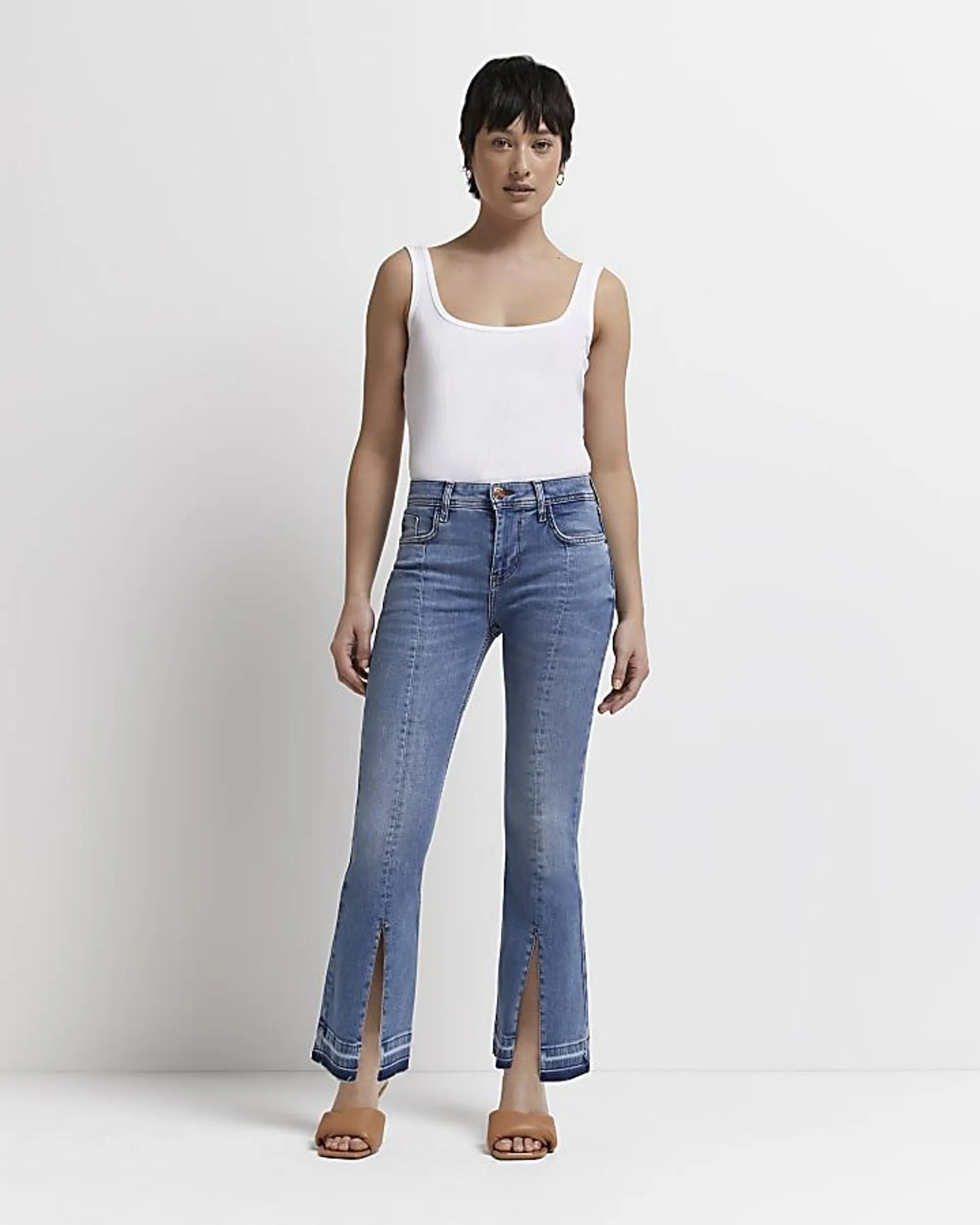 Petite blue mid rise flared jeans