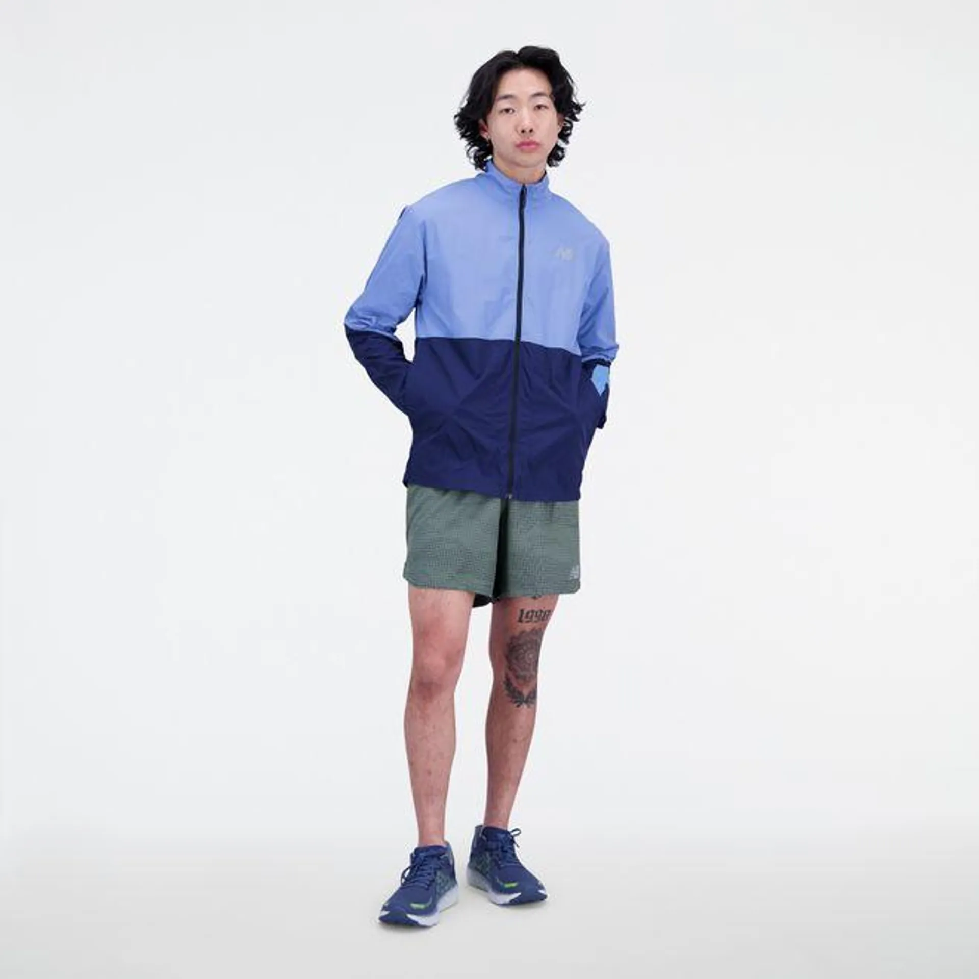 New Balance Graphic Impact Run Packable Jacket in Blue