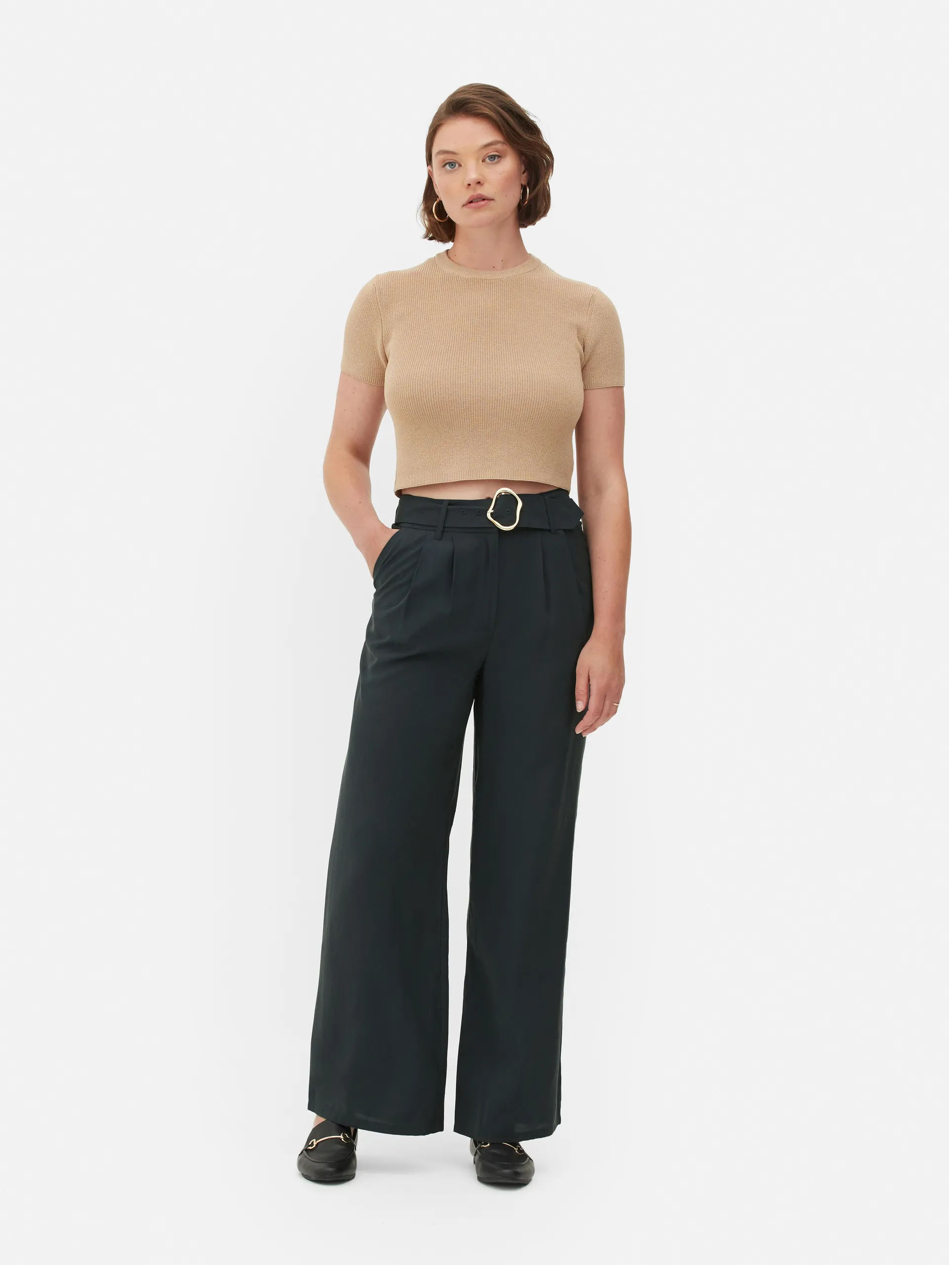 These bold buckle wide leg trouser are a cool take on tailoring