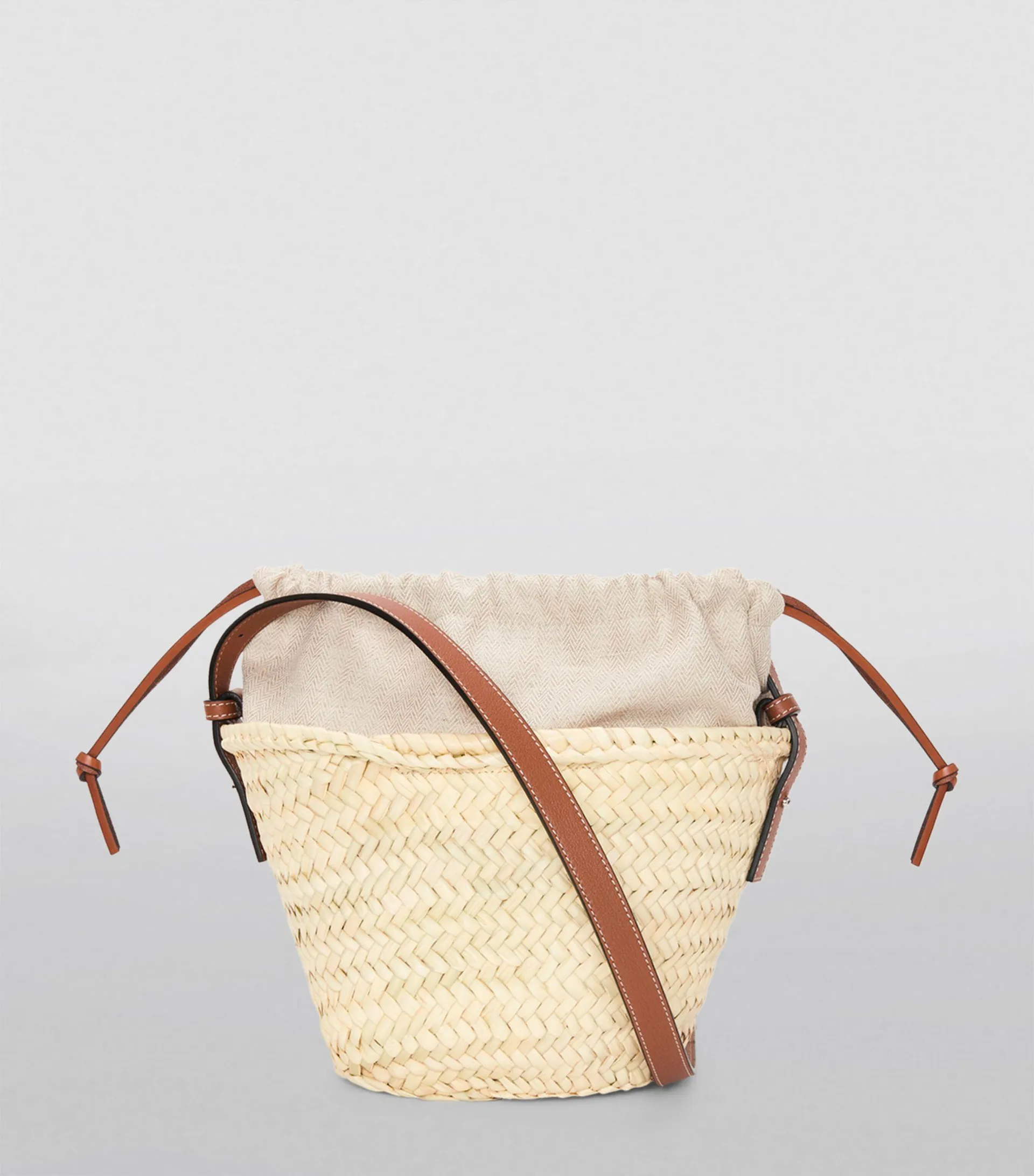 x Paula's Ibiza Woven Drawstring Bucket Bag