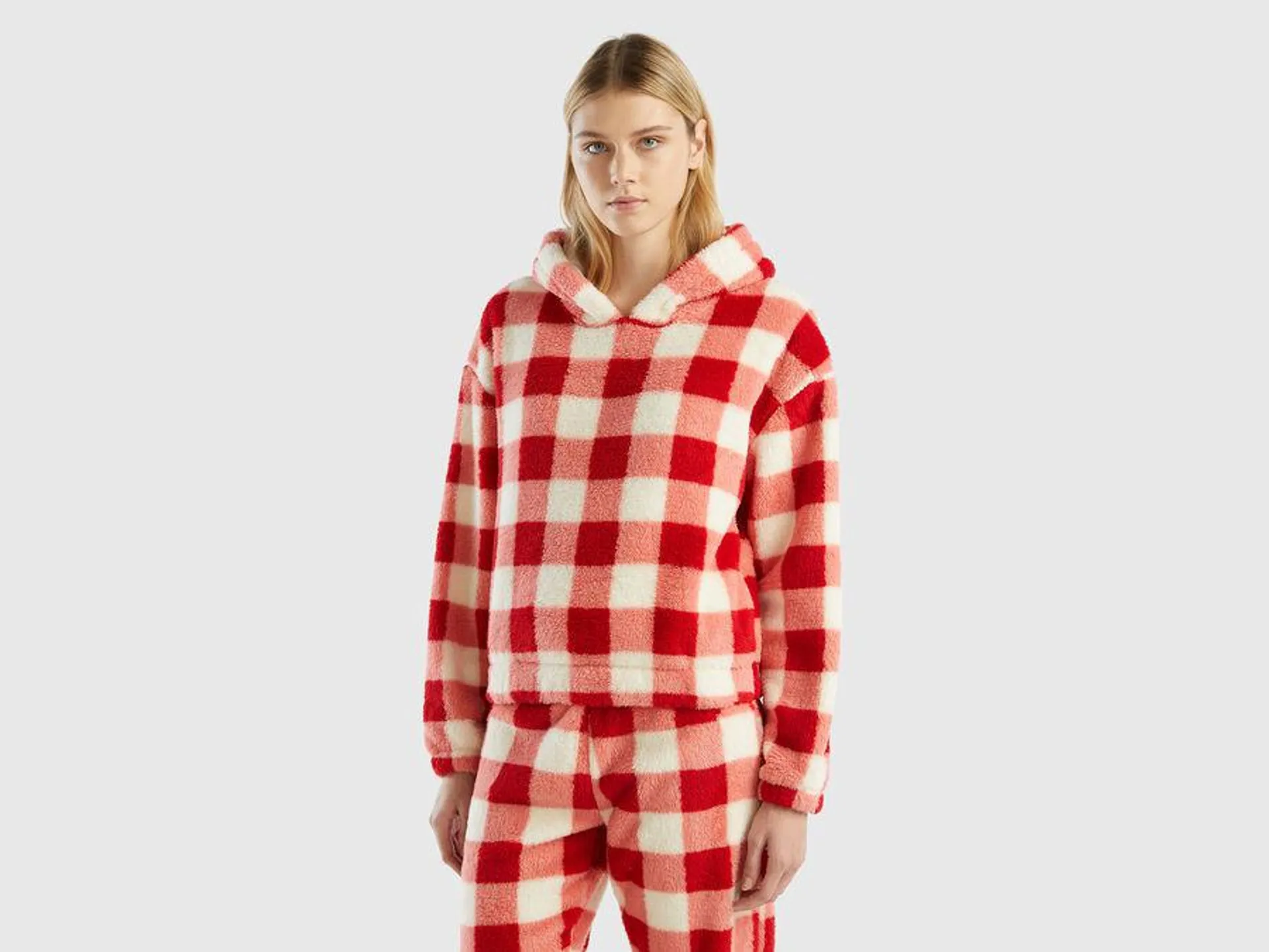 Hooded top in checked fur