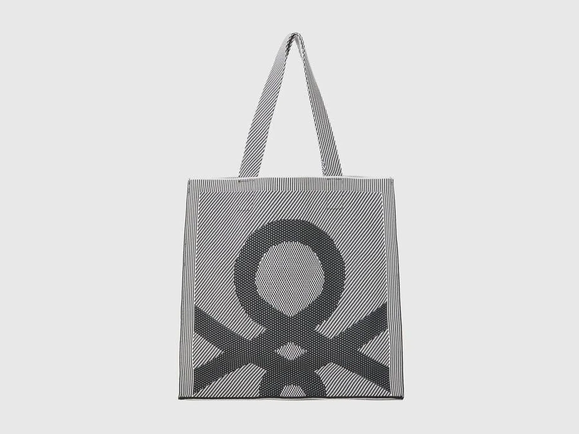 Black and white reversible tote bag