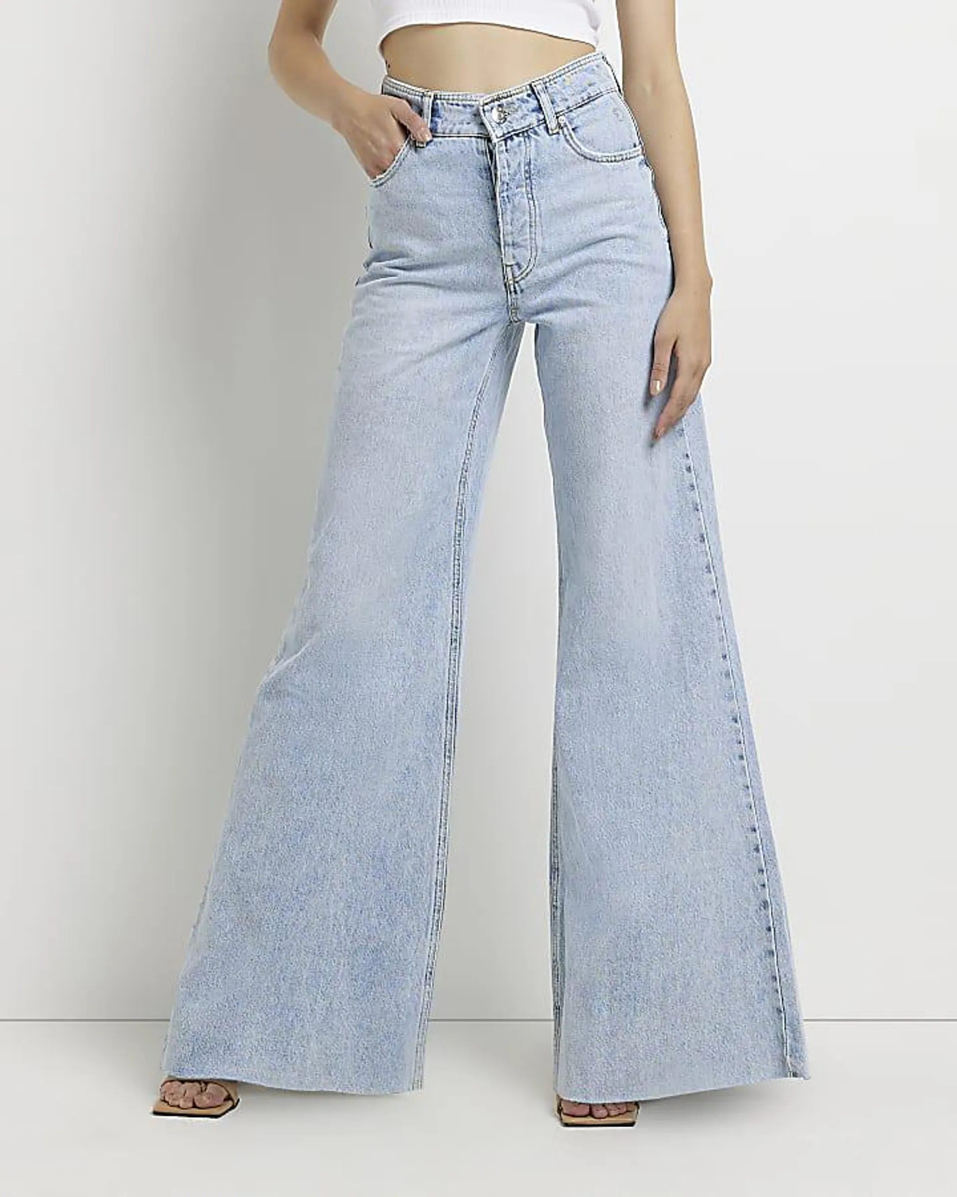 Blue mid rise ultra flared jeans