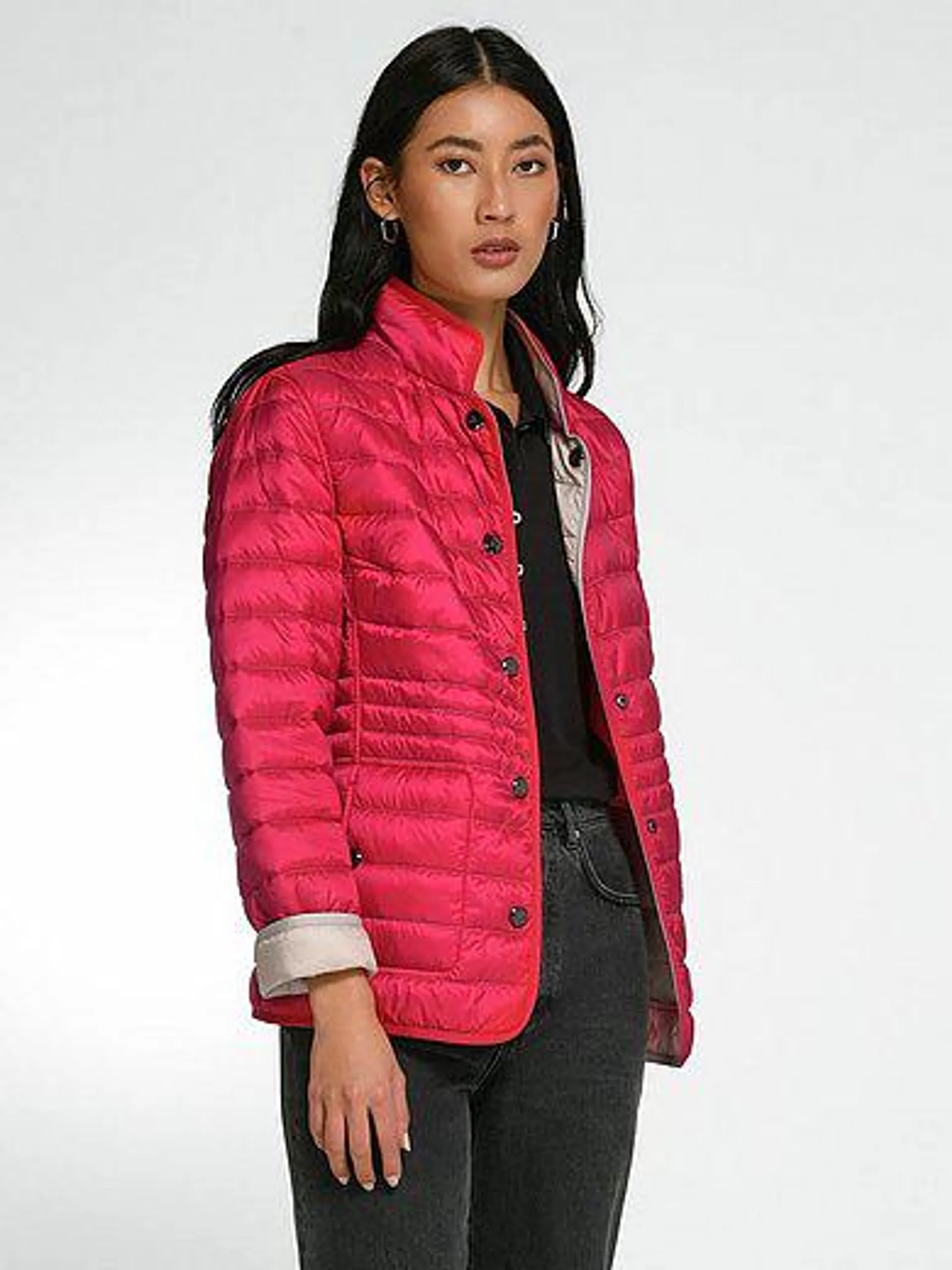 Reversible quilted jacket with stand-up collar