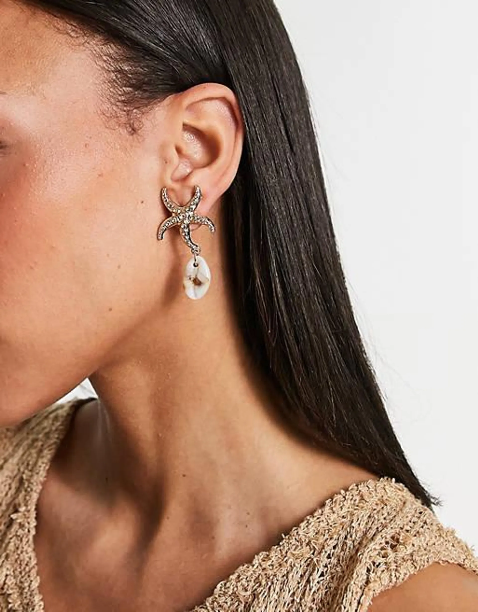 ASOS DESIGN drop earrings with sea shell design in gold tone