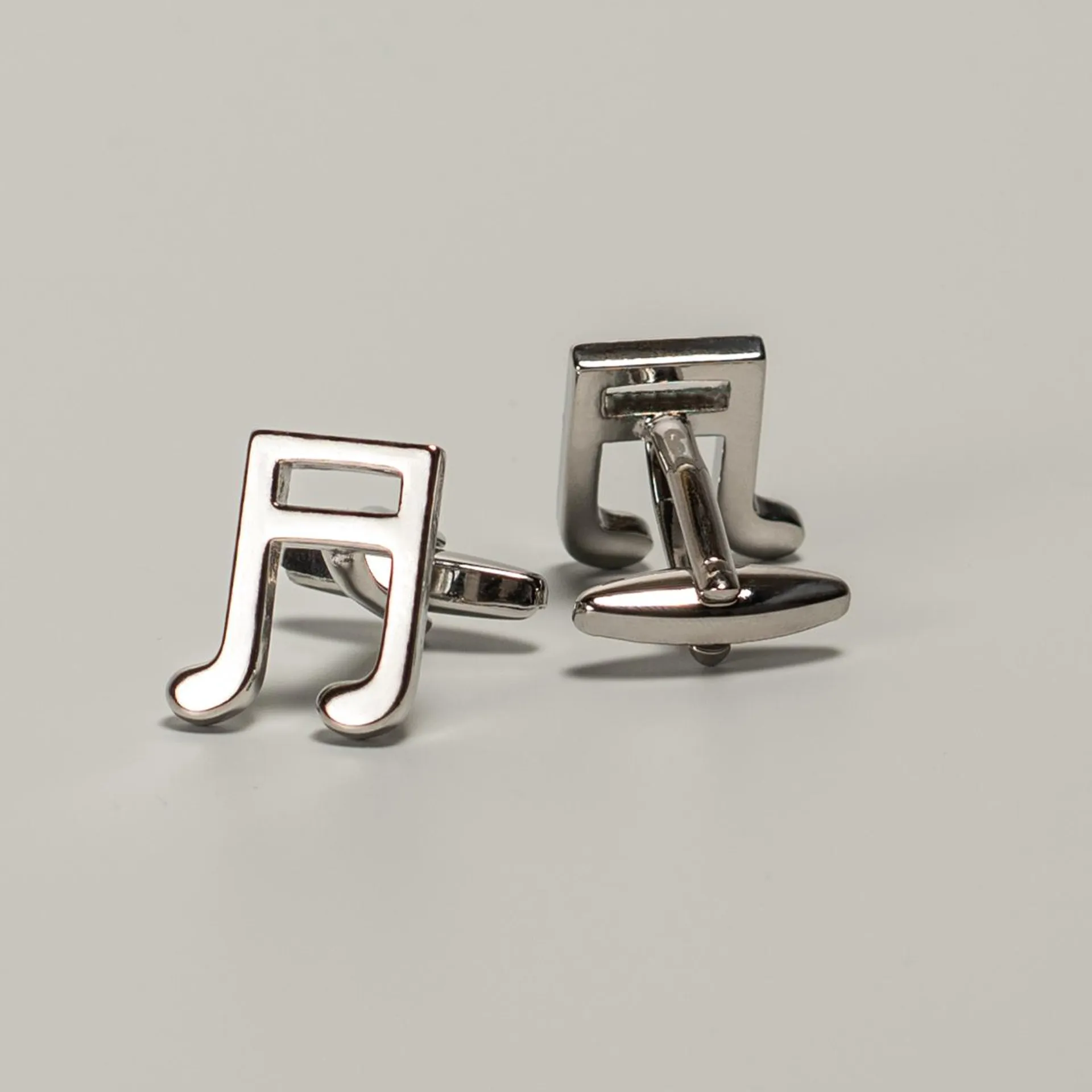 Silver colored cufflinks