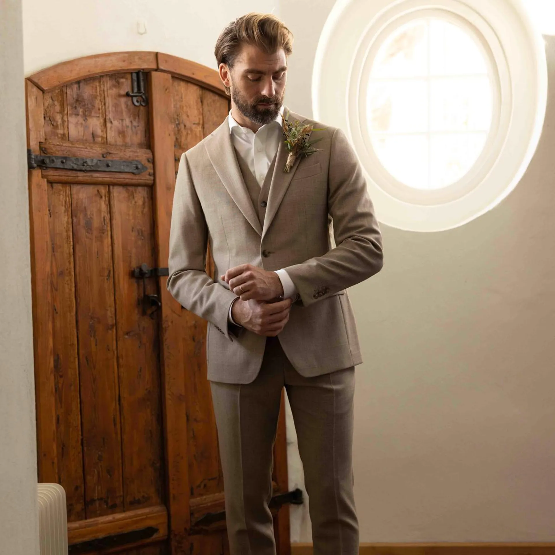 Beige three-piece suit