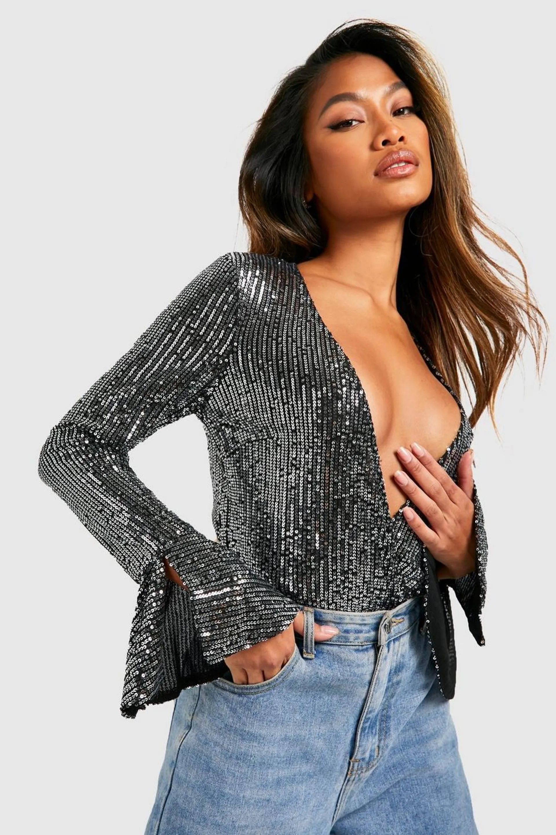 Black Sequin Wrap Ruffle Cuff Bodysuit