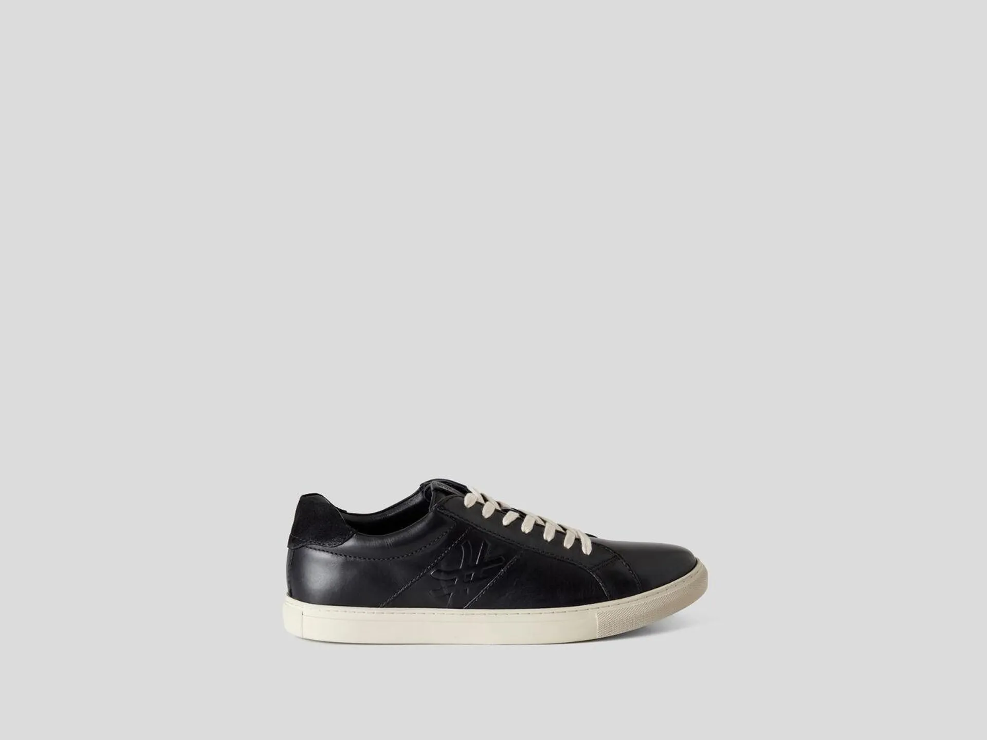 Sneakers in genuine leather with logo