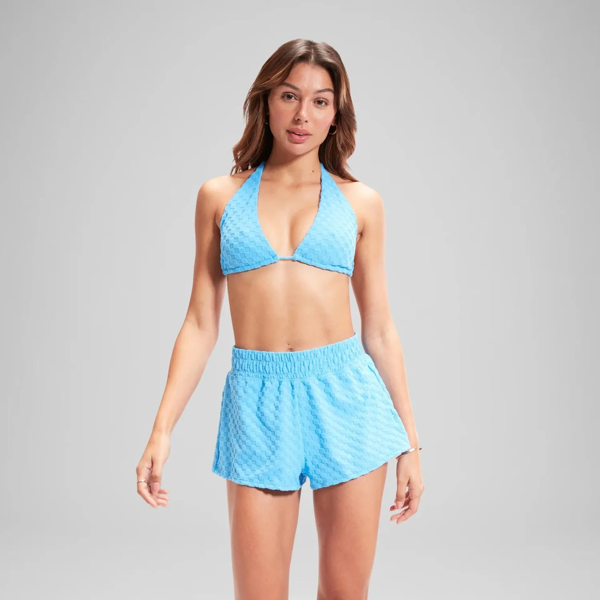 Top de bikini azul de diseño triangular en tejido de rizo FLU3NTE