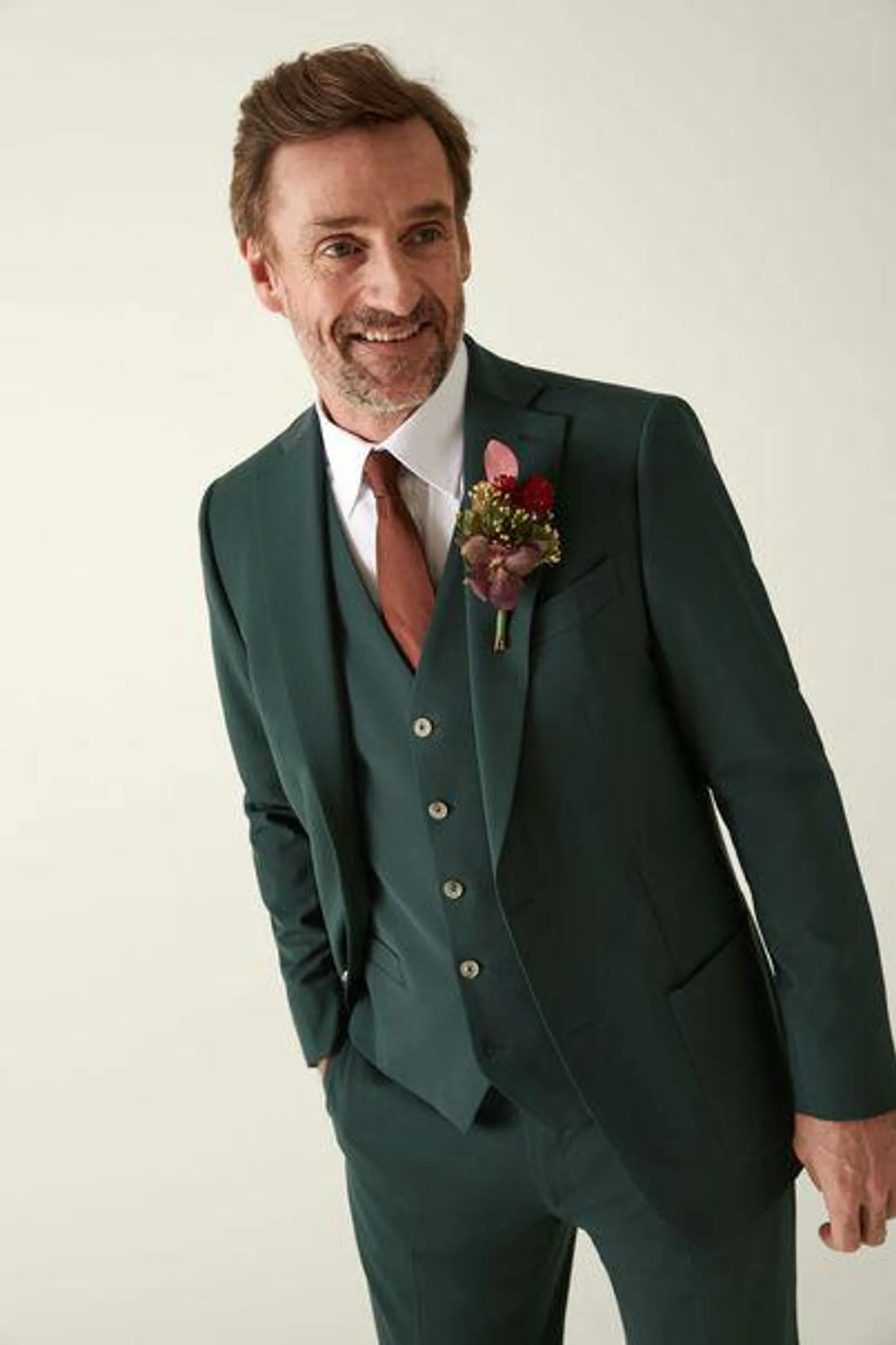 Dark green three-piece suit