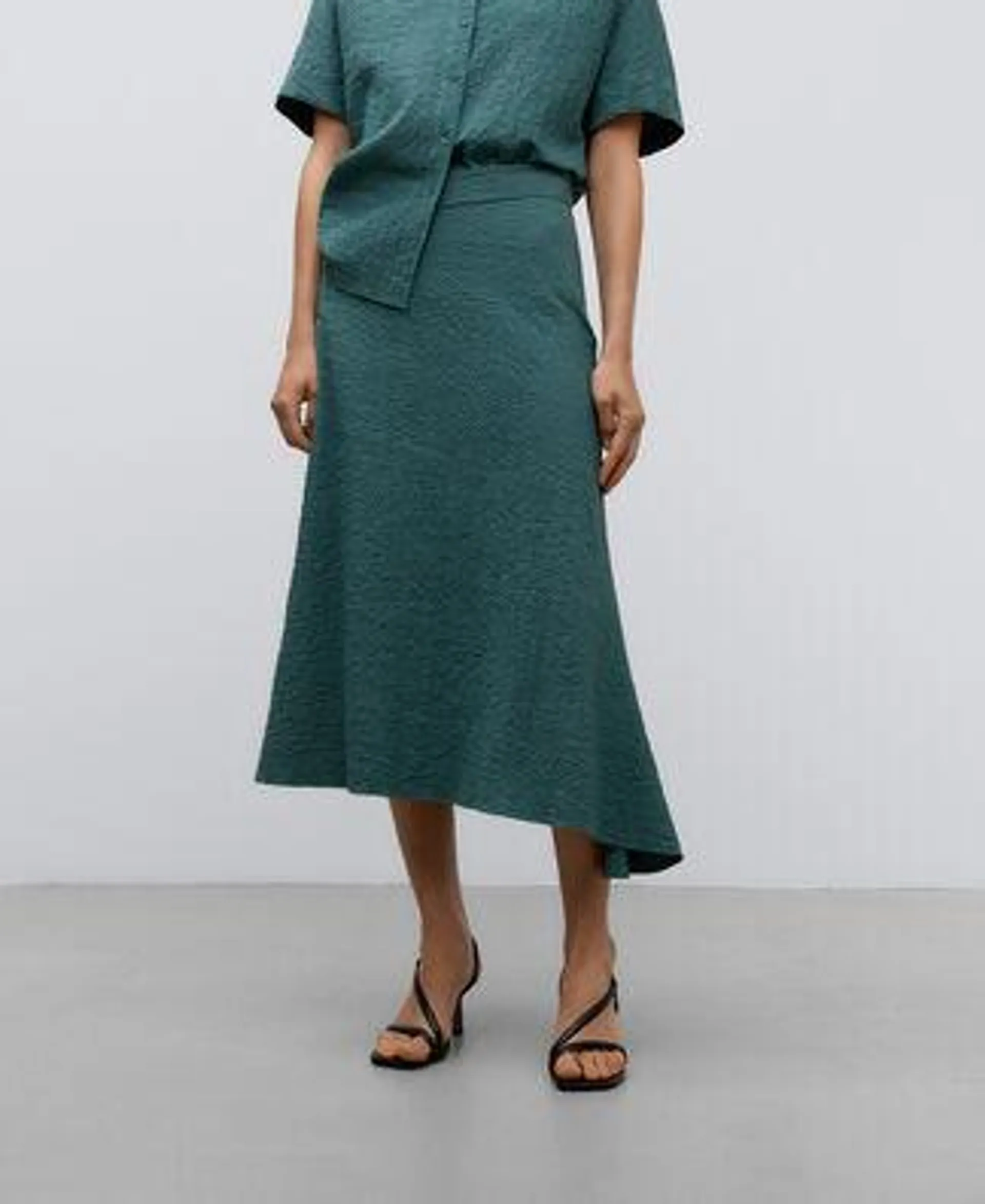 Green cotton asymmetric skirt woman