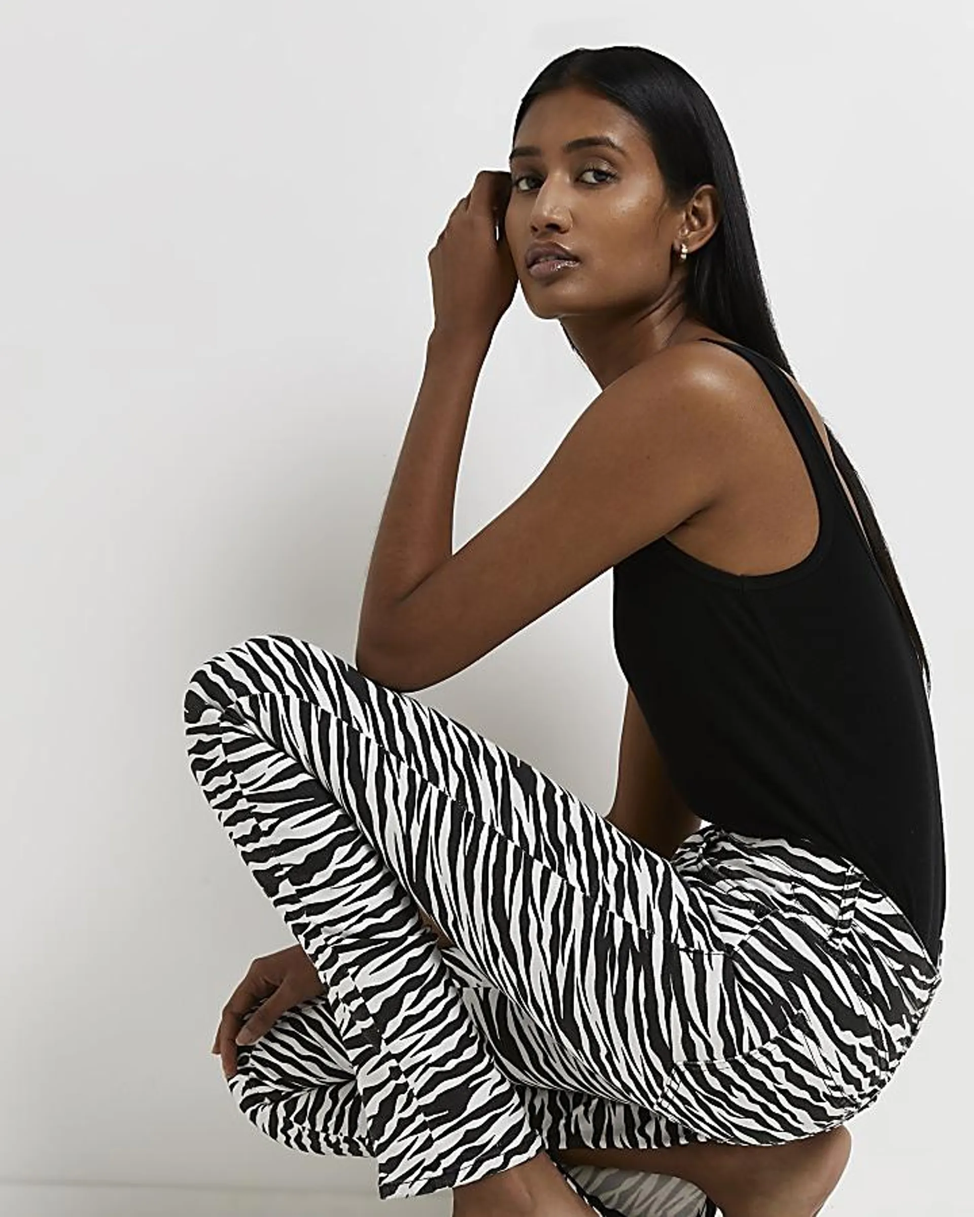 Black zebra bum sculpt skinny jeans