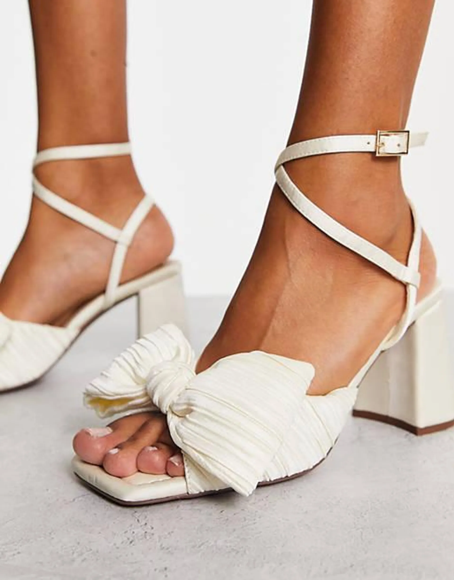 ASOS DESIGN Hitched bow detail mid heeled sandals in ivory