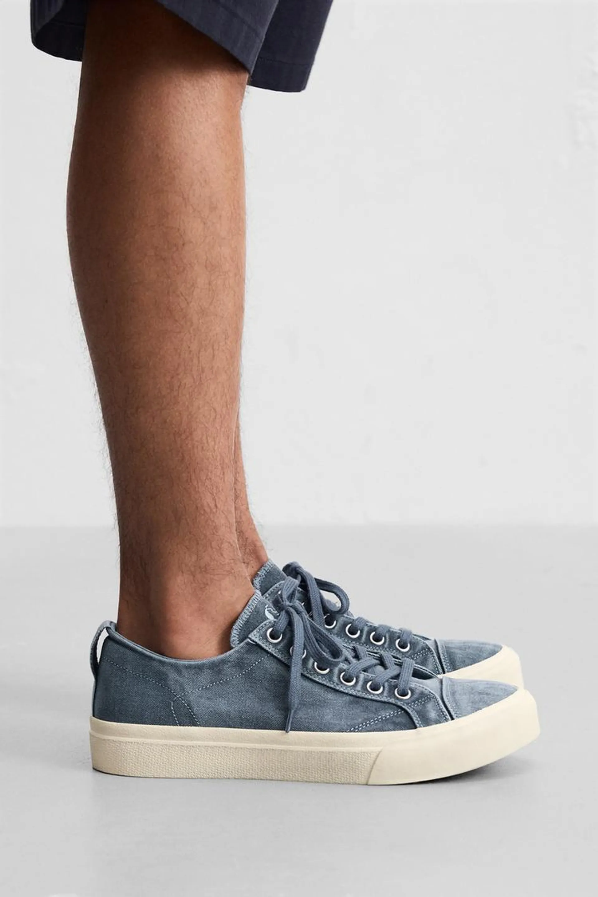 DISTRESSED FABRIC SNEAKERS