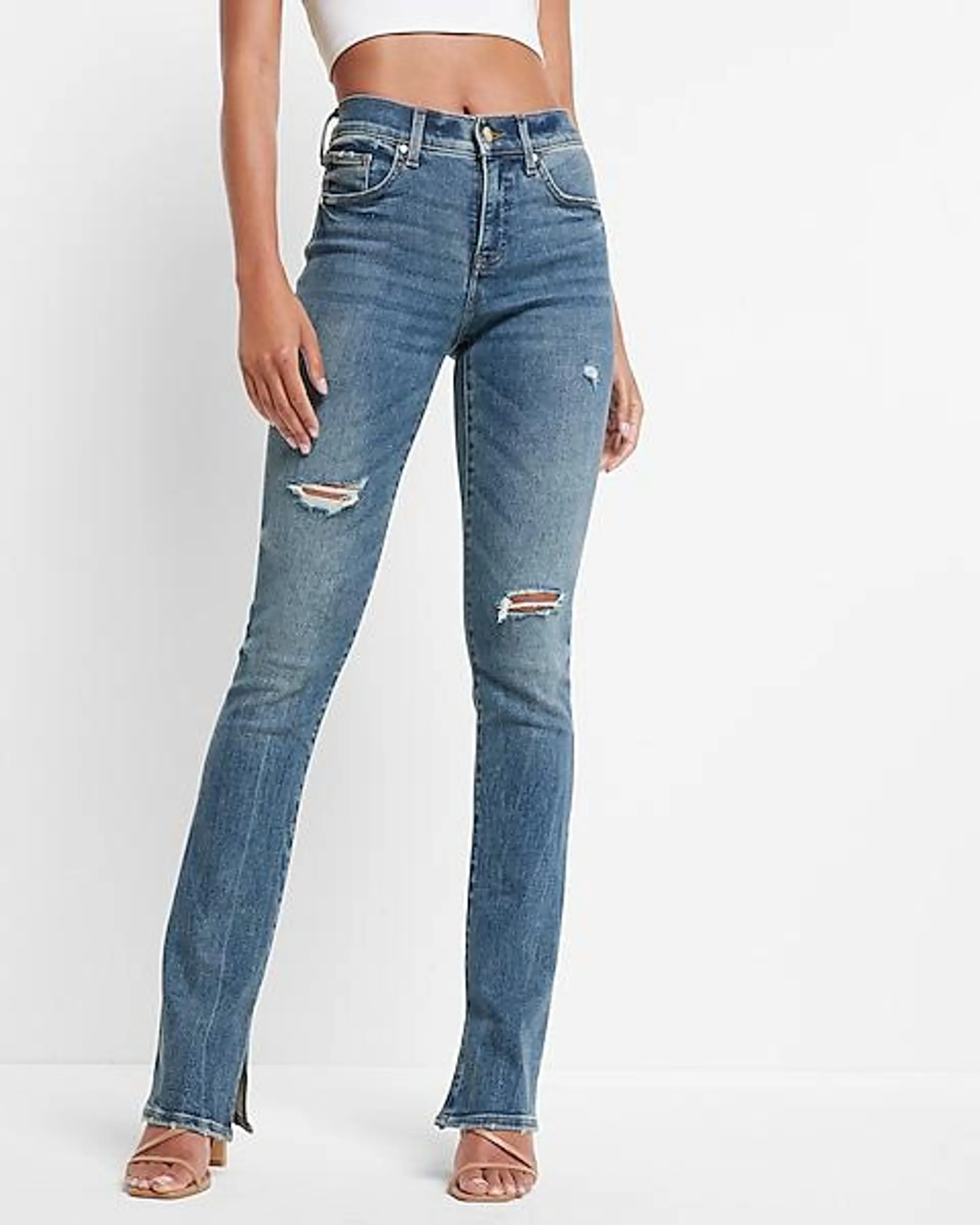 Mid Rise Medium Wash Ripped Skyscraper Jeans