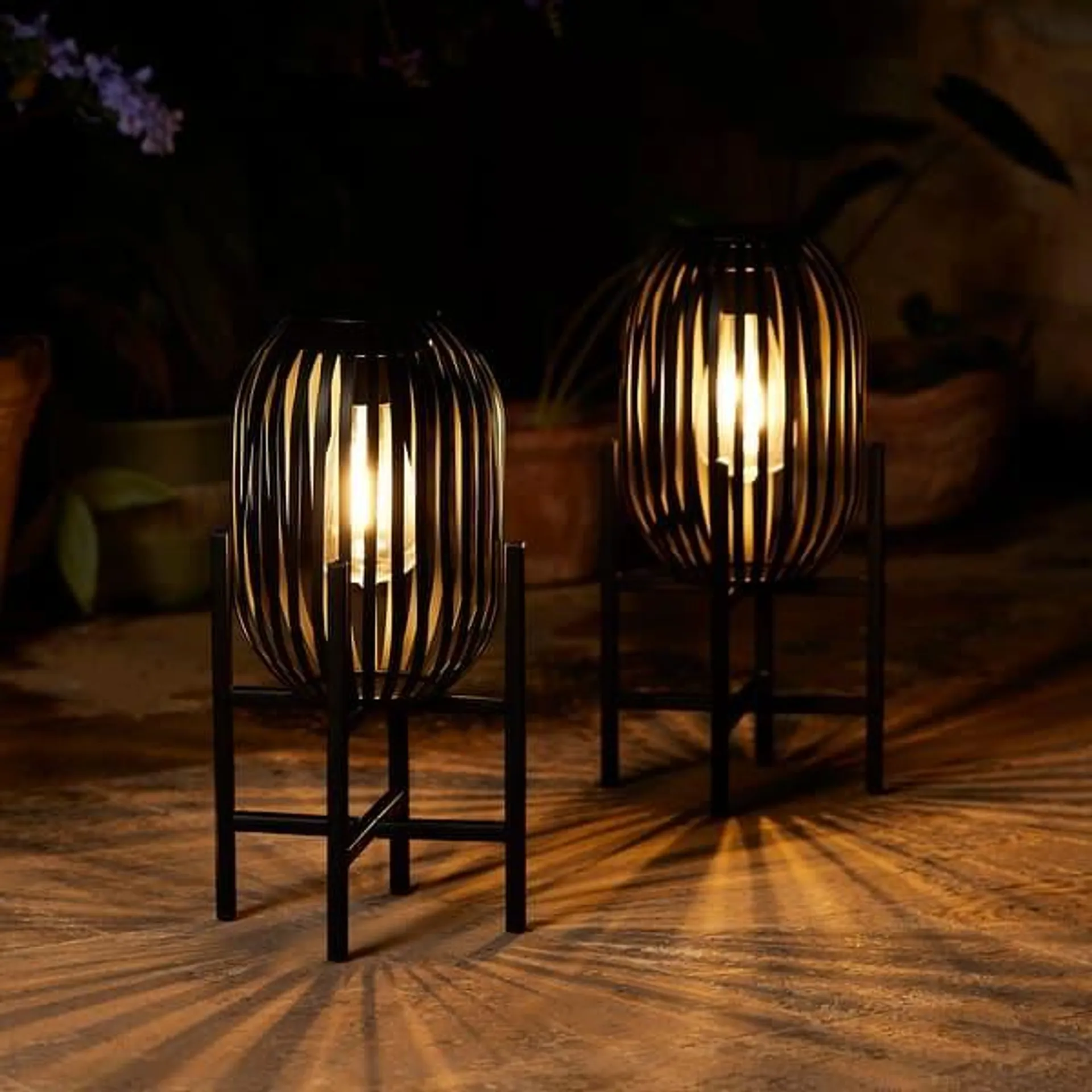 Glitzhome Set of 2 Outdoor Black Metal Striped Solar Lantern Floor Lamp