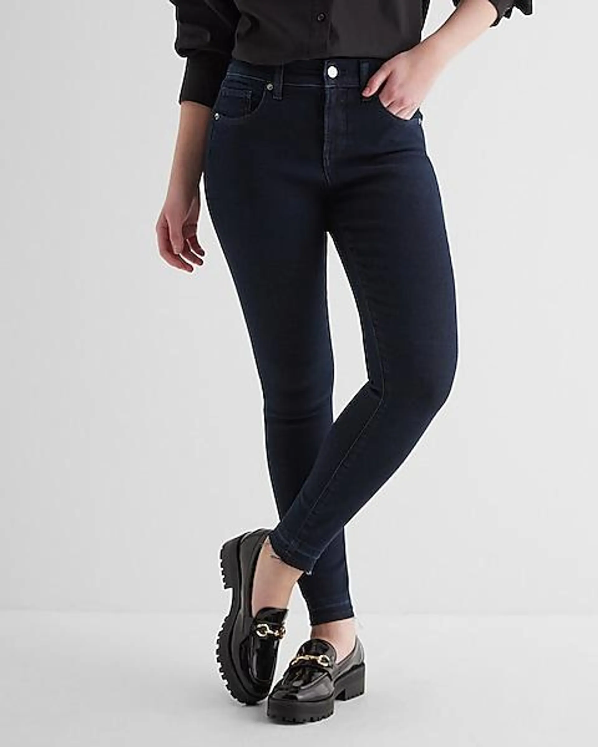 Mid Rise Dark Wash Raw Hem Skinny Jeans