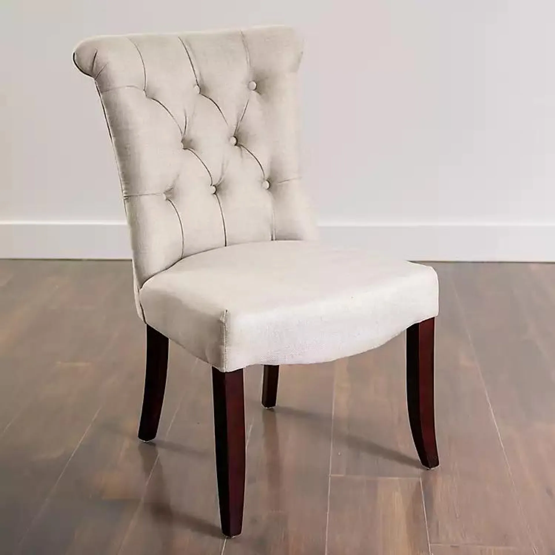 Cream Tufted Dining Chair with Rolled Back